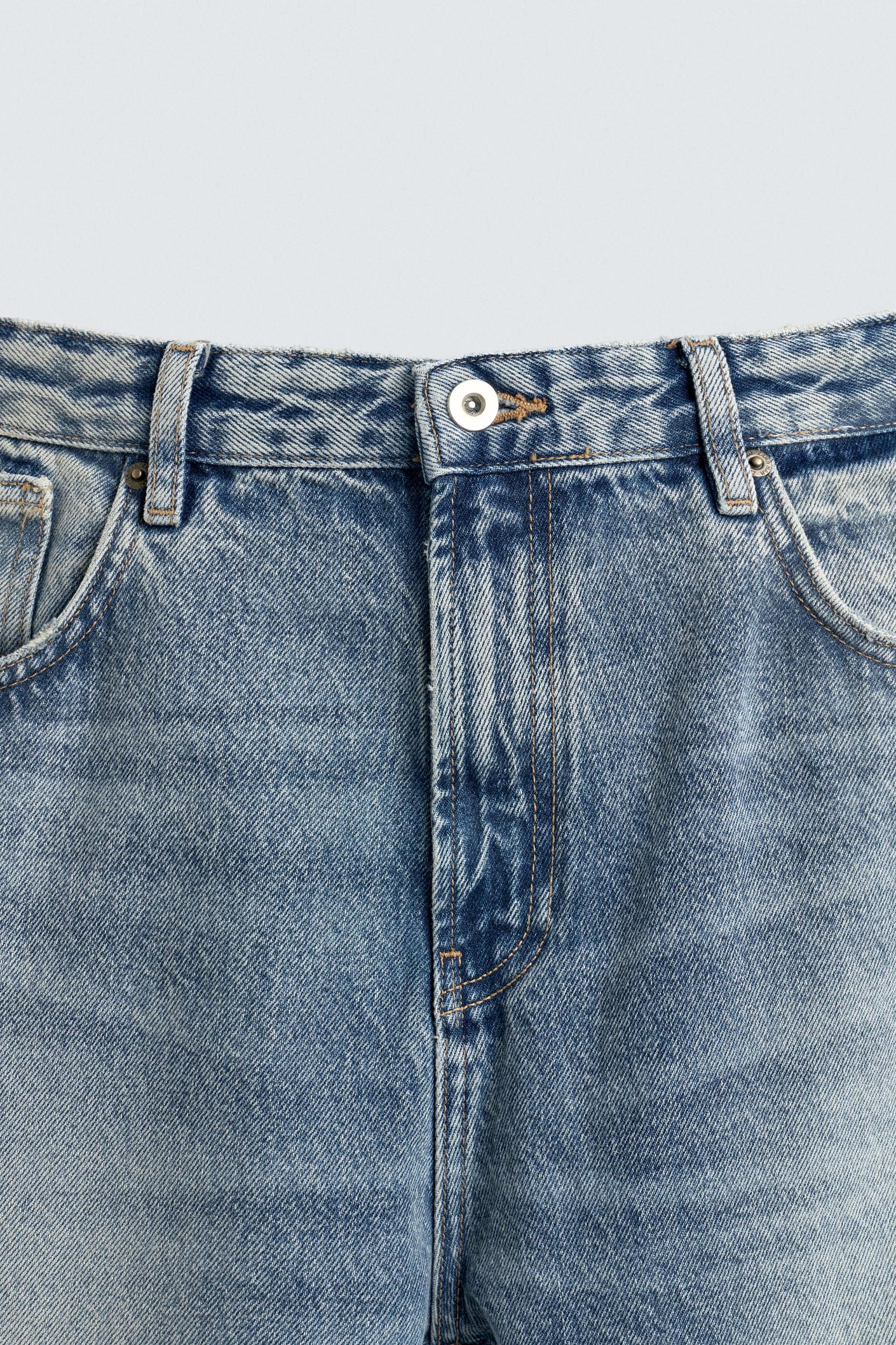 RIPPED FLARE FIT JEANS Product Image