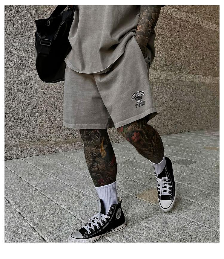 Elbow-Sleeve Crew Neck Lettering Print T-Shirt / Drawstring Waist Wide Leg Sweat Shorts Product Image
