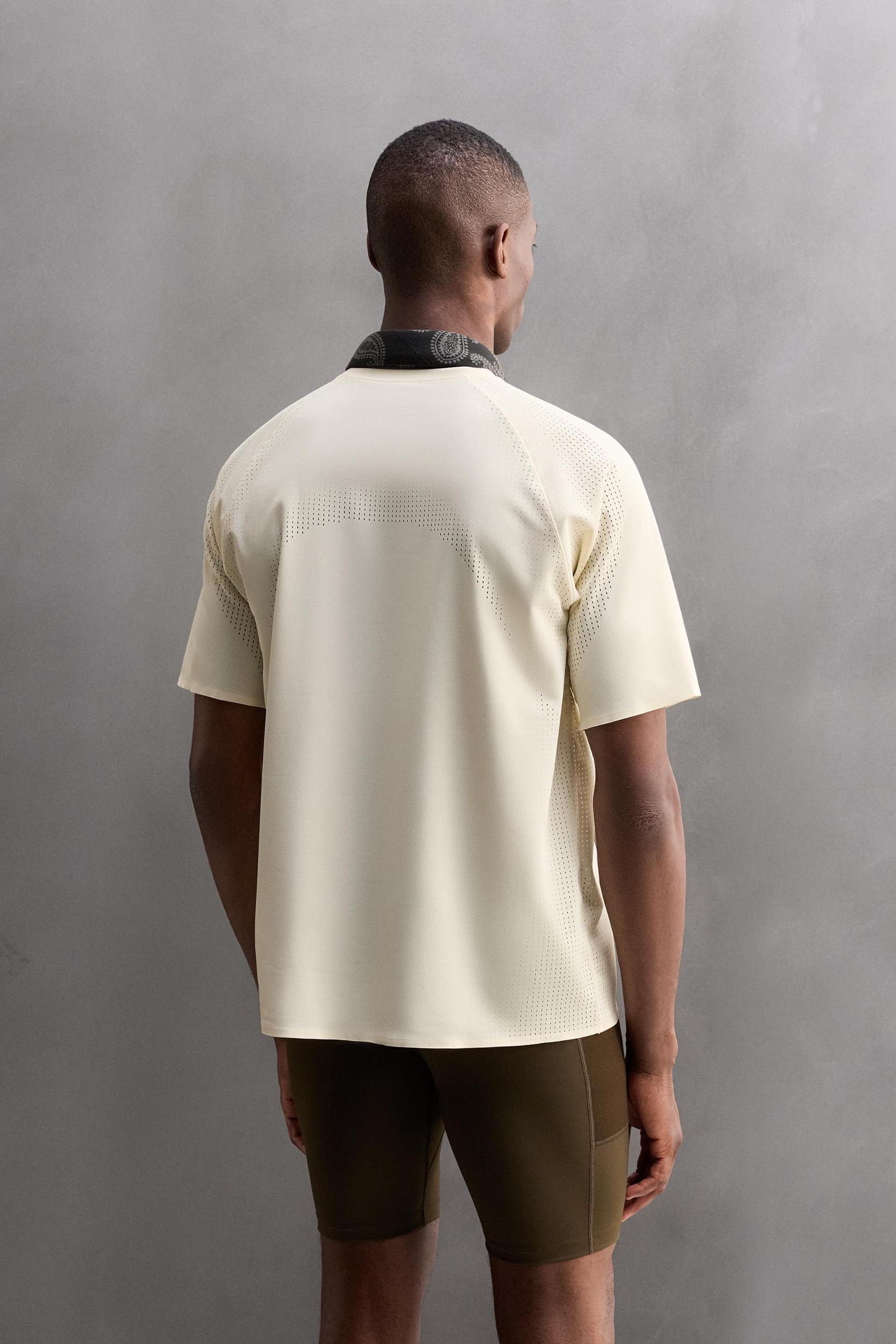 OPEN KNIT STRUCTURE T-SHIRT Product Image