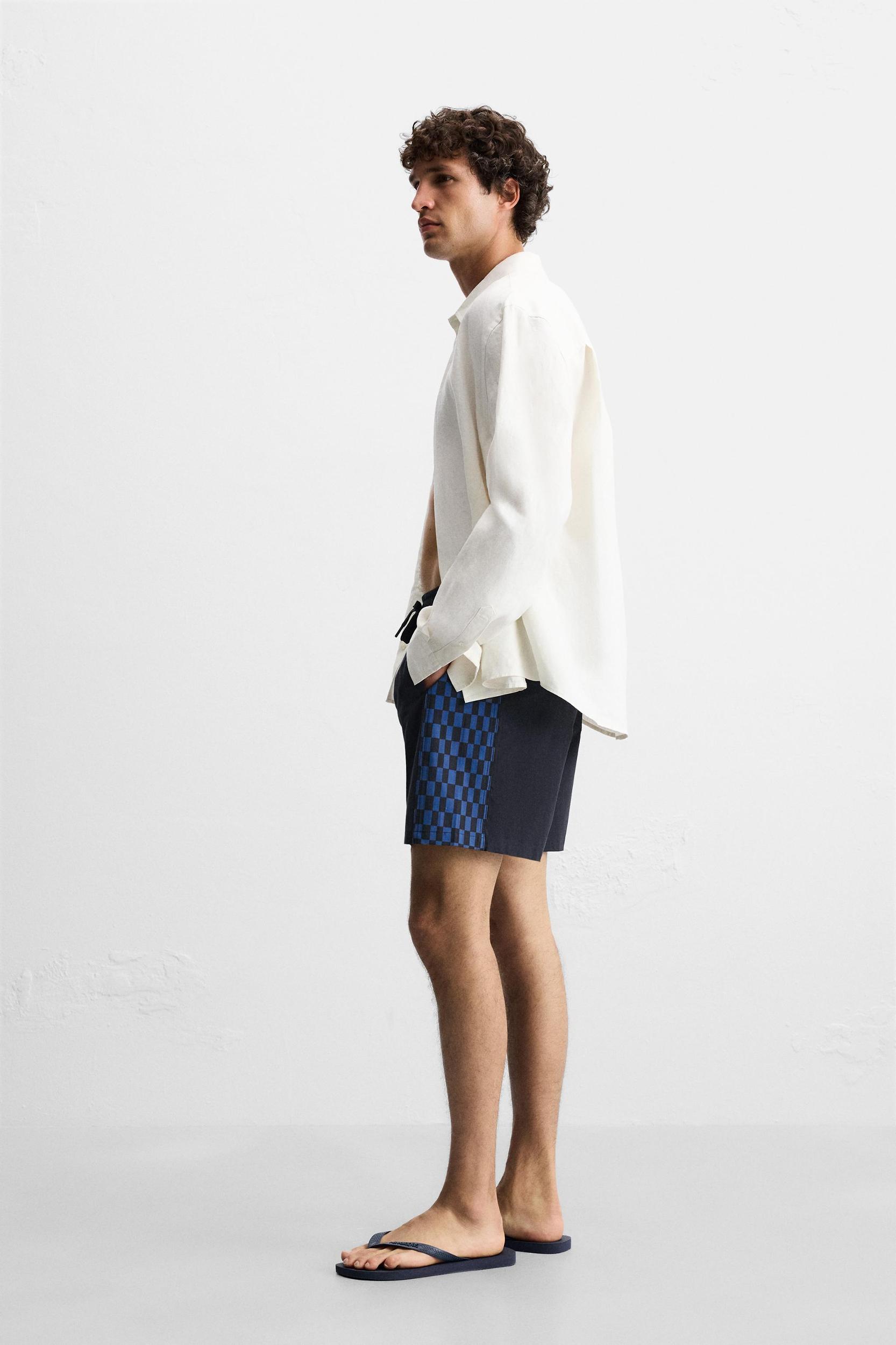 LONG CHECKERED BANDS SWIMSUIT Product Image