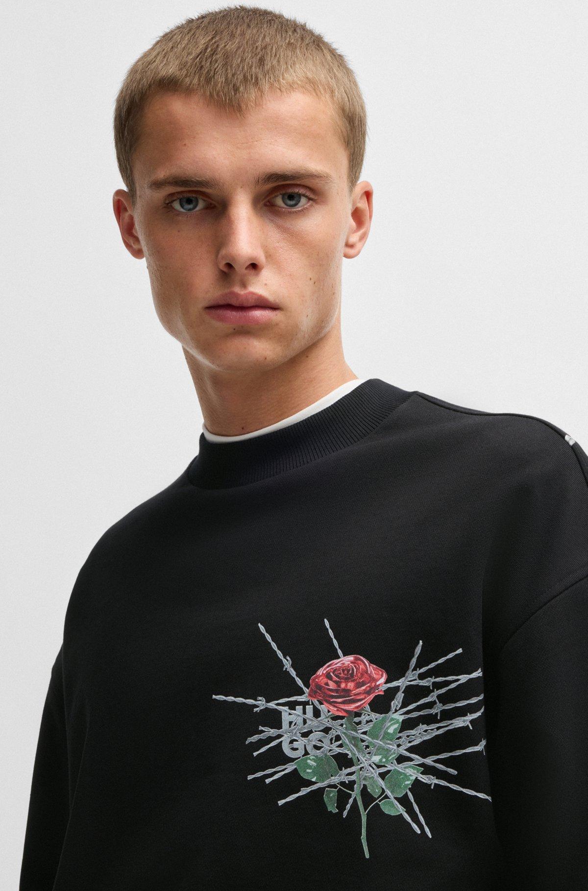 Cotton-terry relaxed-fit sweatshirt with seasonal prints Product Image