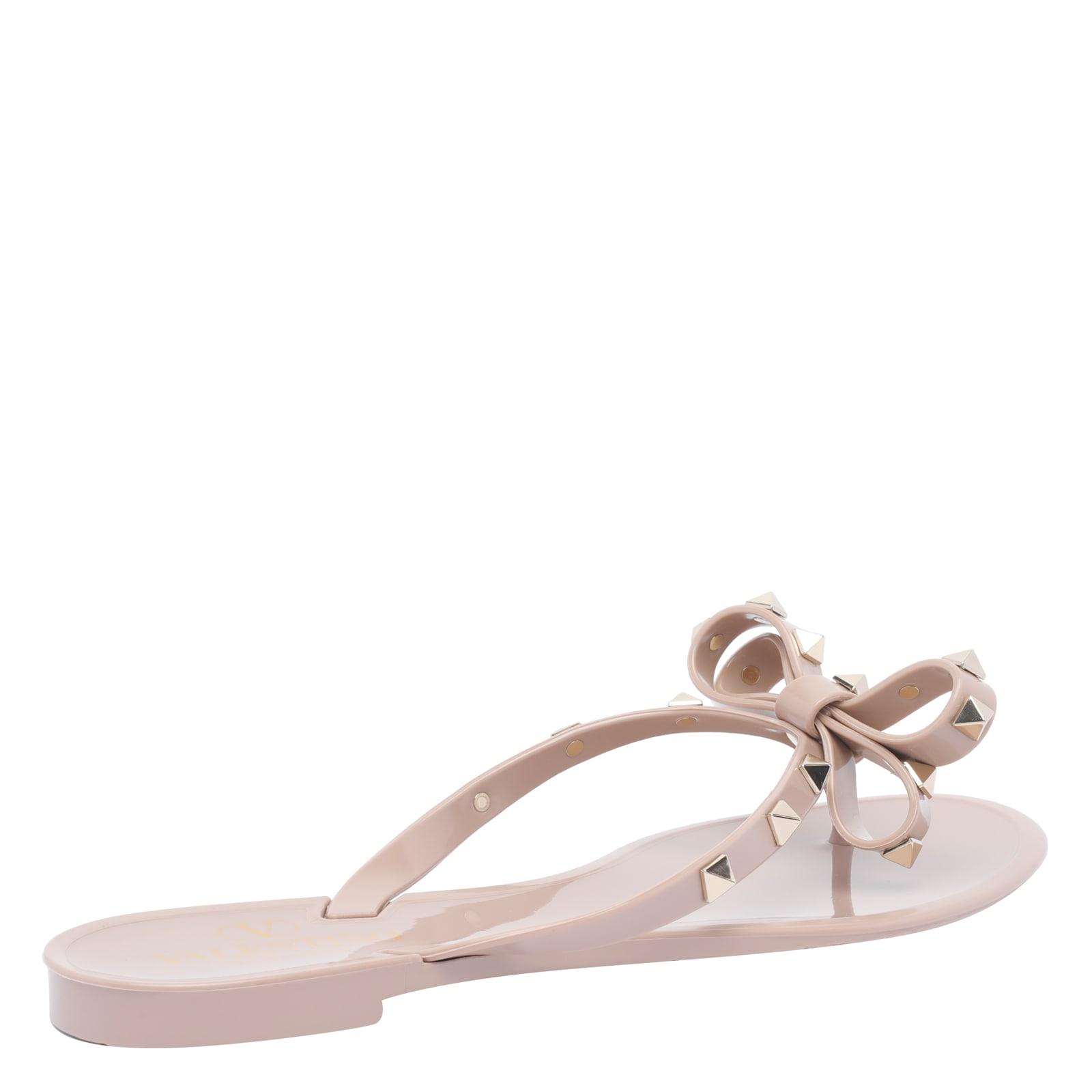 VALENTINO GARAVANI Women Rockstud Rubber Flip Flops In Beige Product Image
