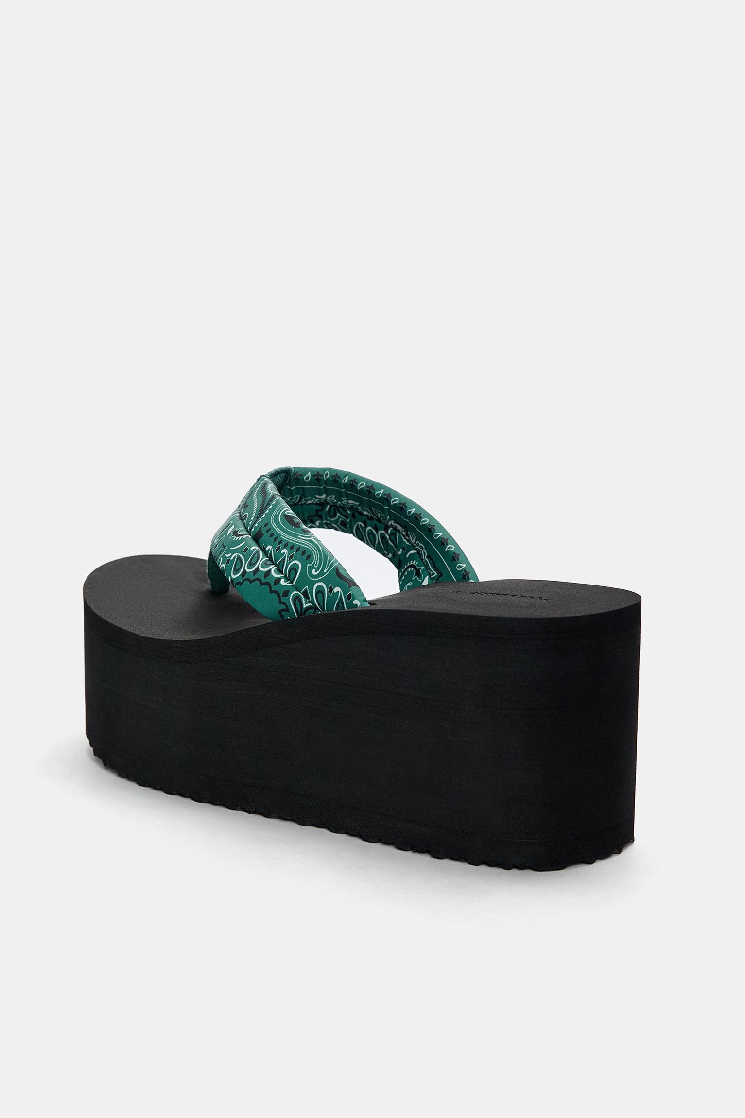 Wedge sandals with detail Product Image