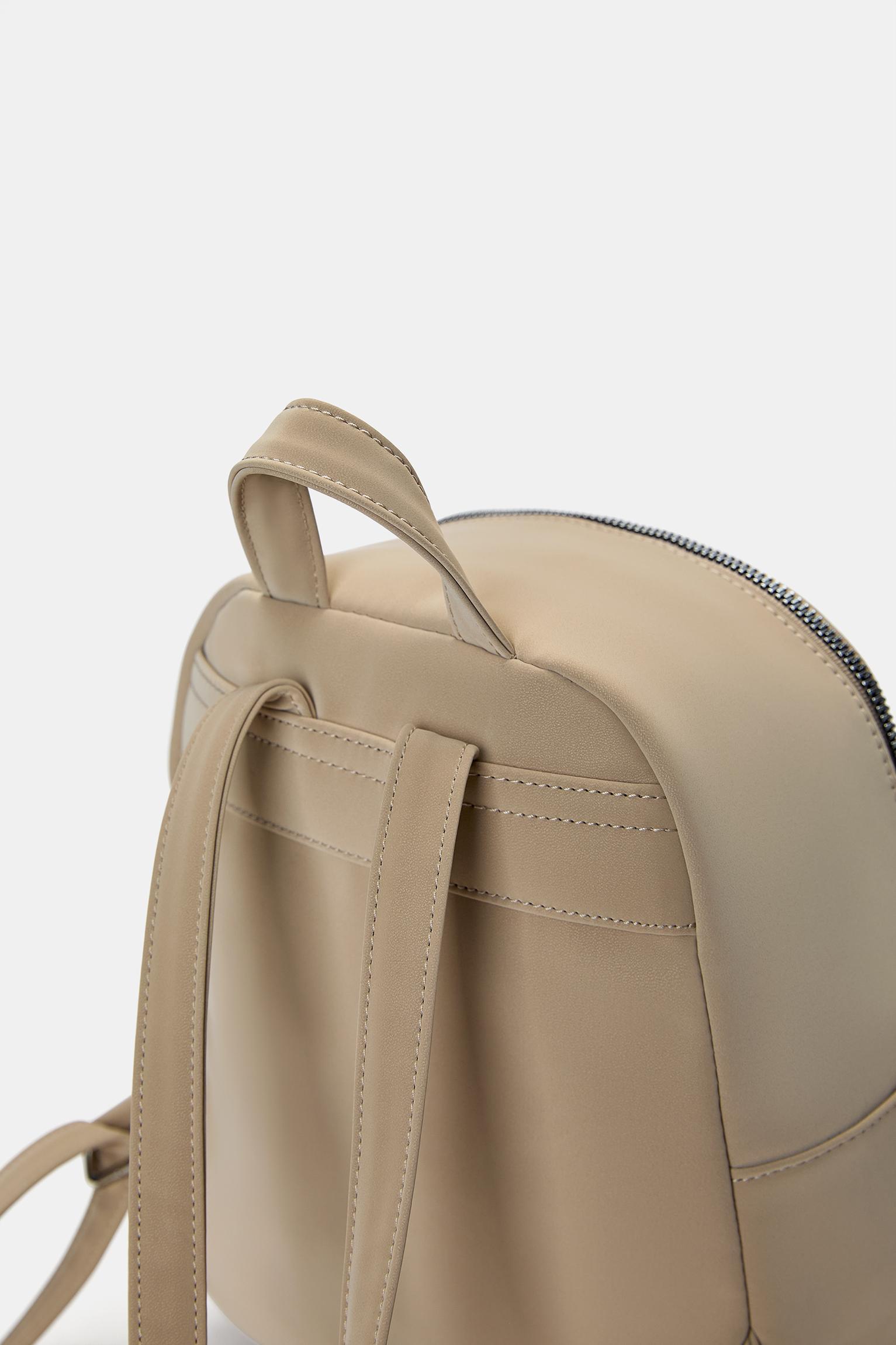 Rubberized mini backpack Product Image