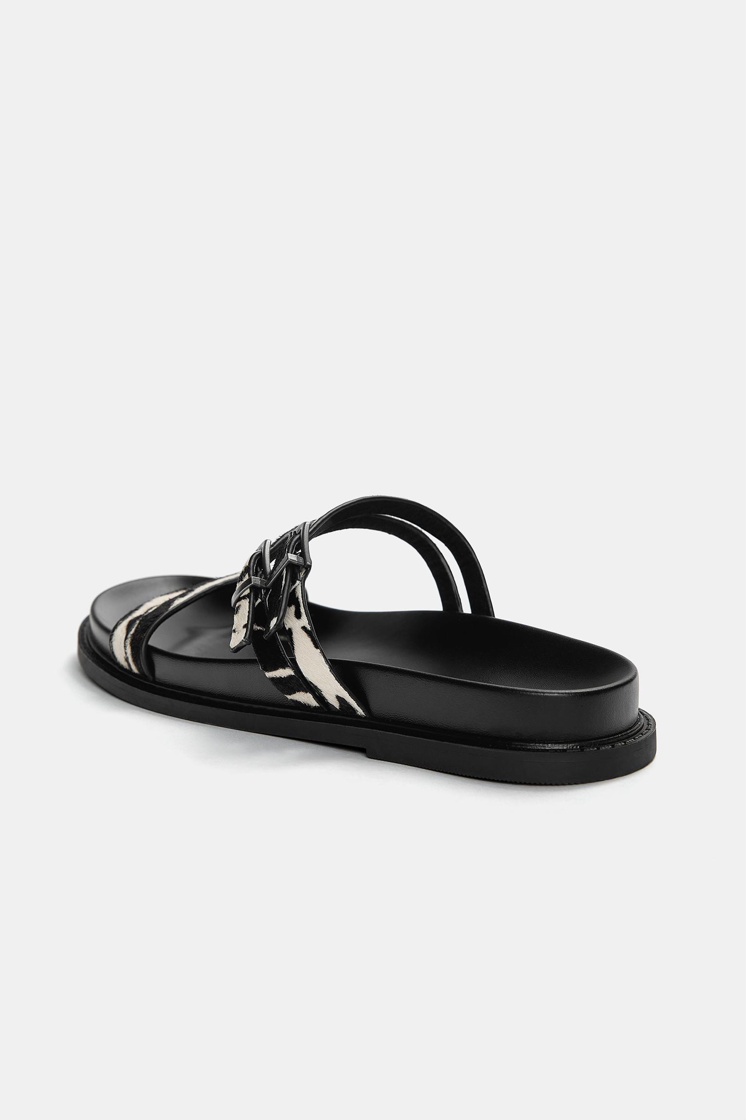Flat leather animal print sandals Product Image