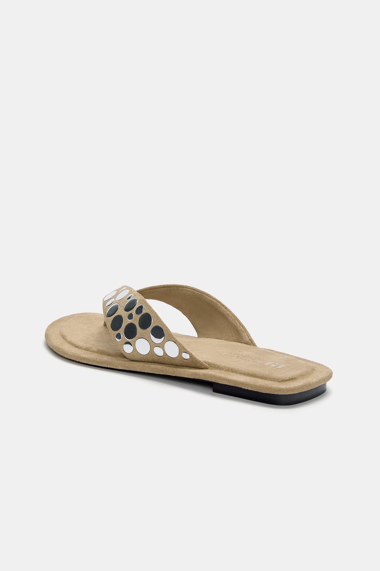 Flat sandals with decorations Product Image