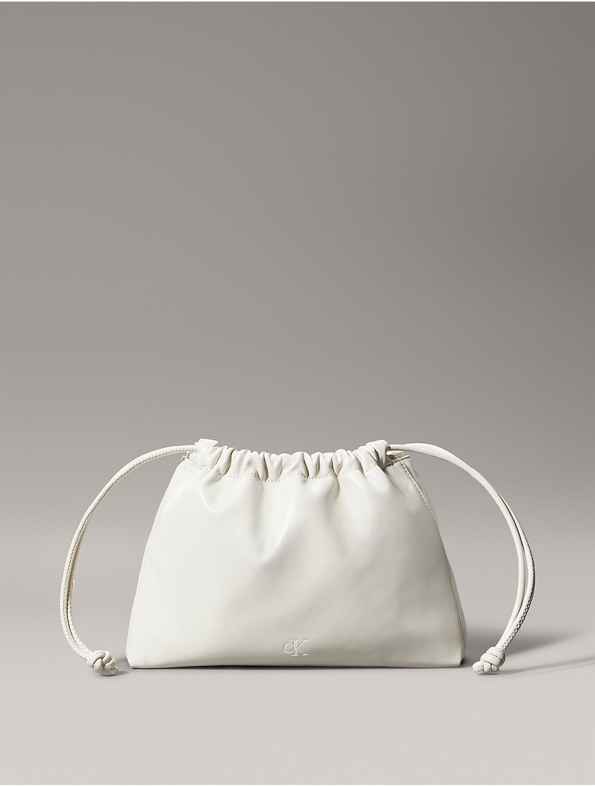 Calvin Klein Womens Monogram Drawstring Crossbody Bag - White Product Image