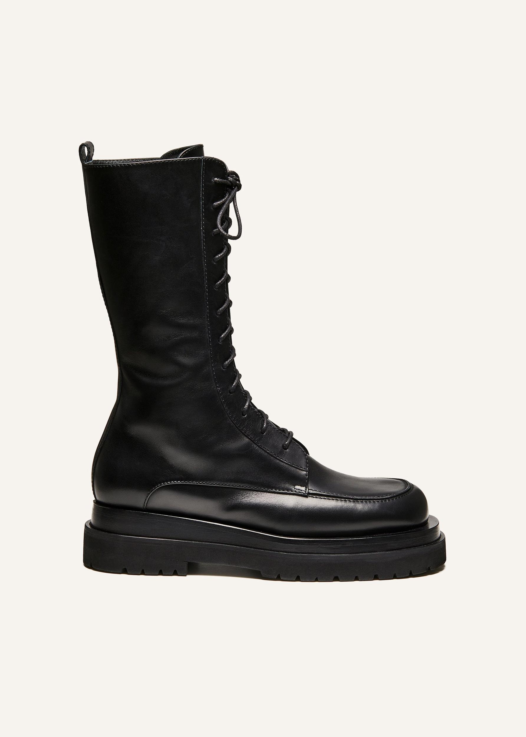 Combat boots in black leather Product Image