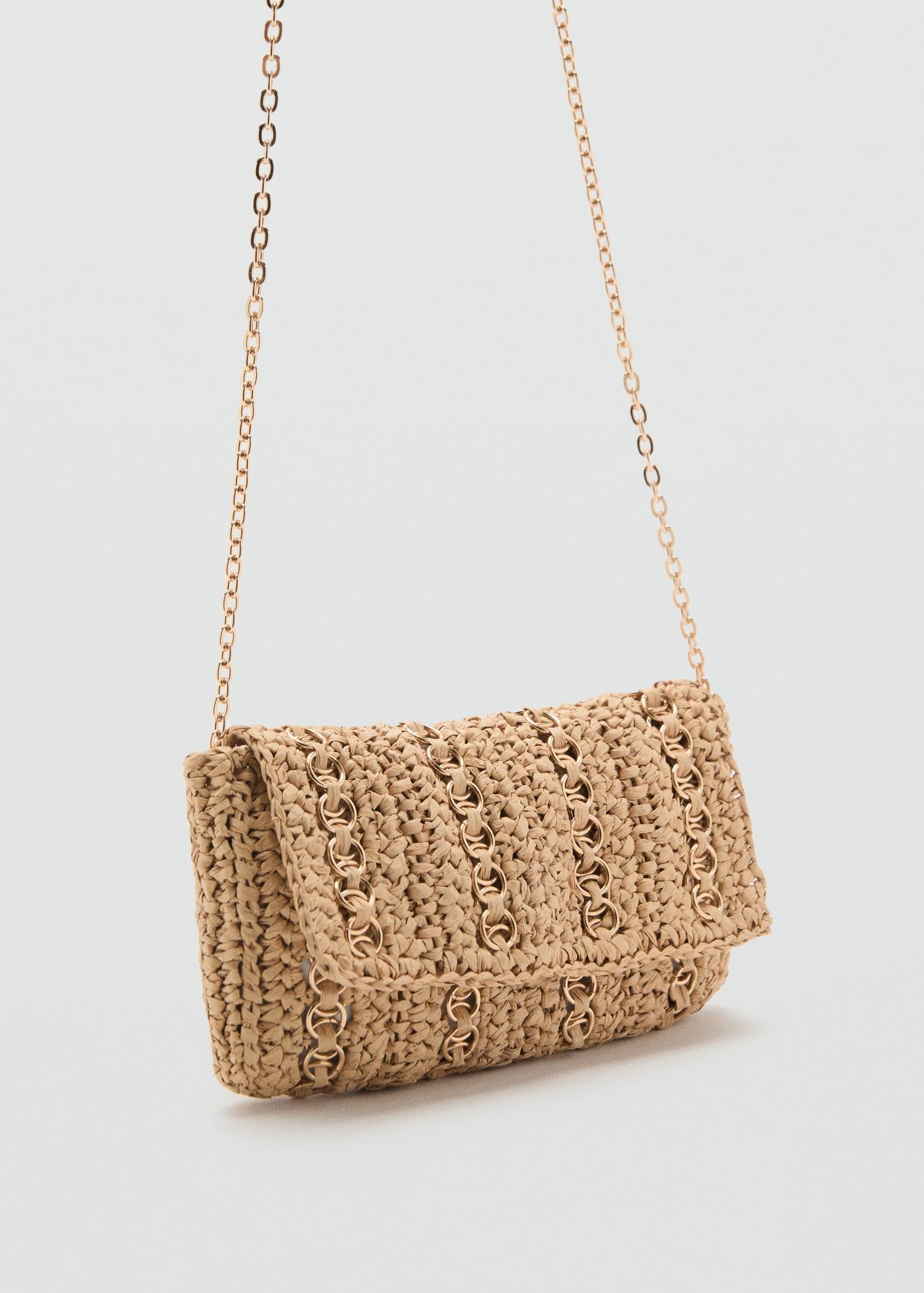 Natural fiber handbag with metal rings - Women | MANGO USA Product Image