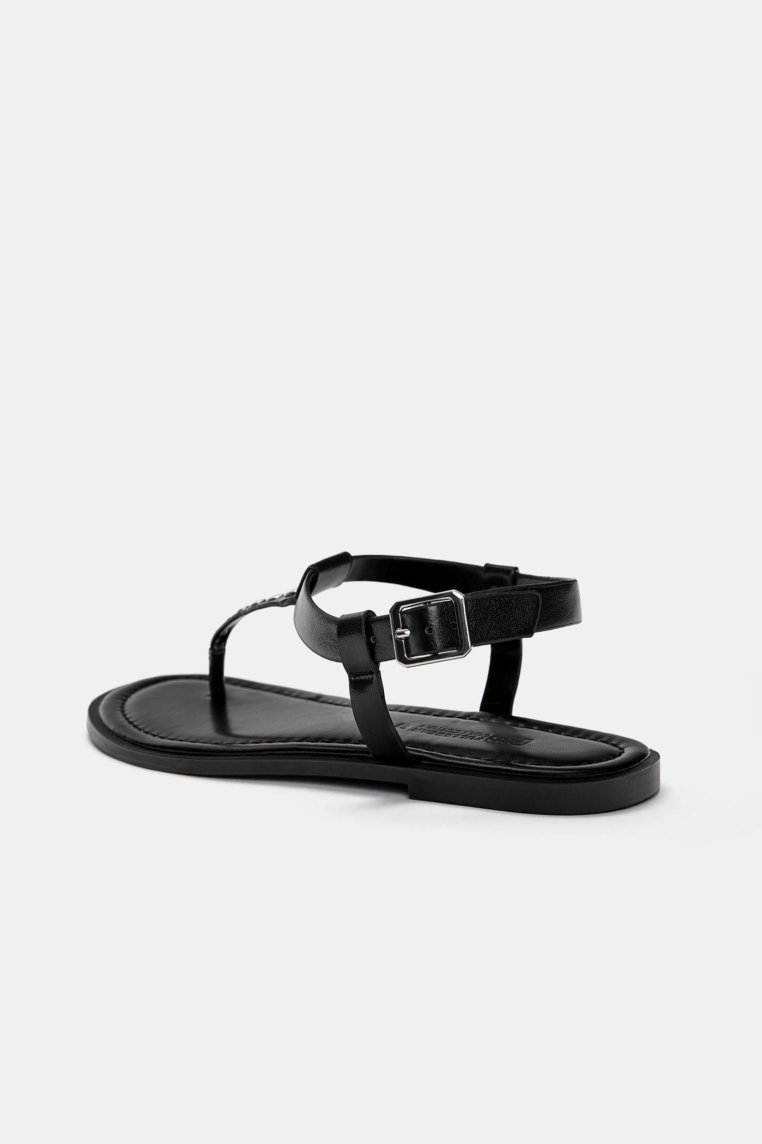 Flat sandals with decorations Product Image