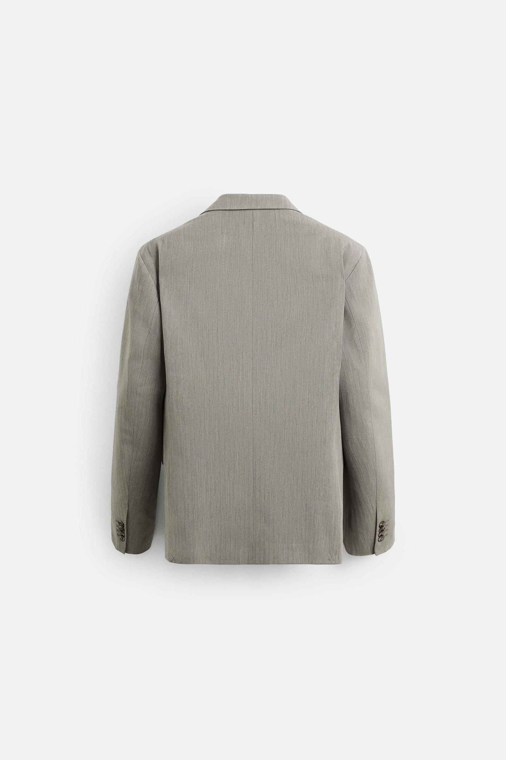 HERRINGBONE SUIT JACKET Product Image