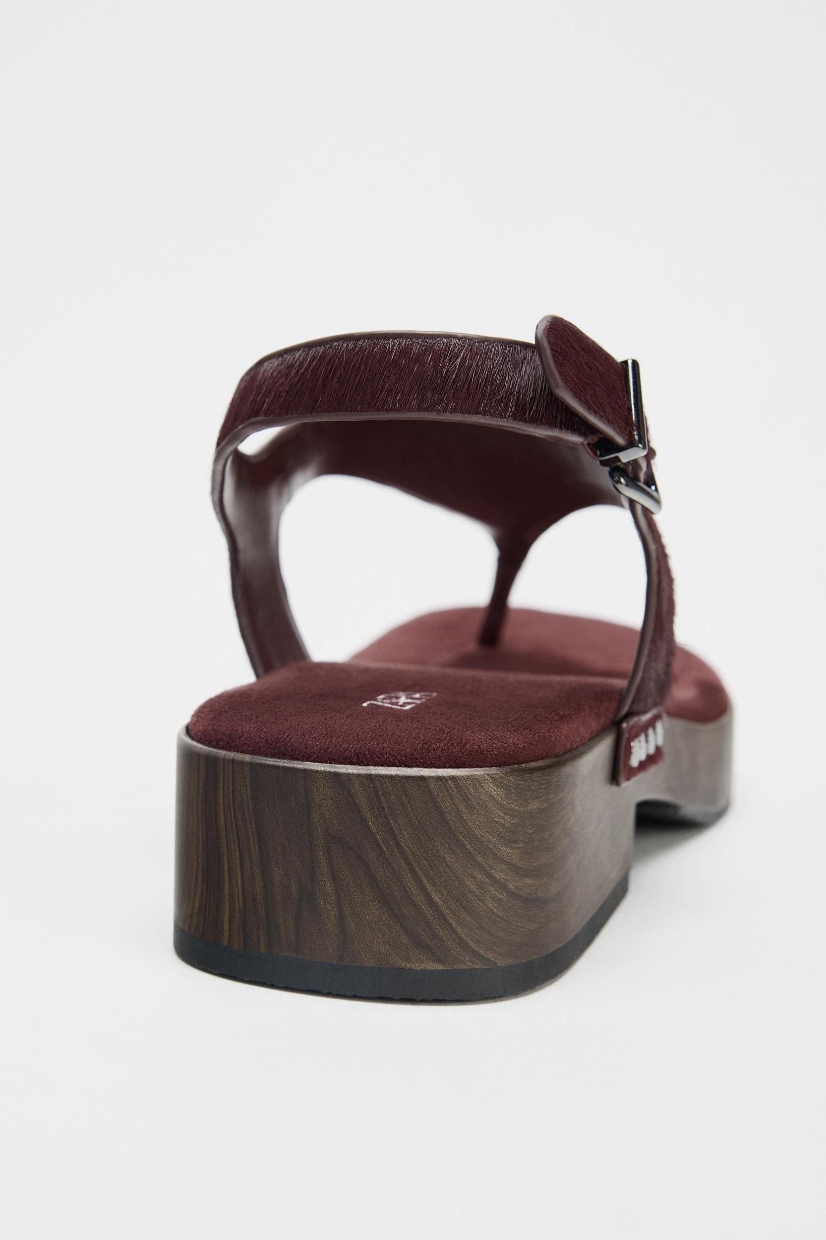 STUDDED LEATHER SANDALS Product Image