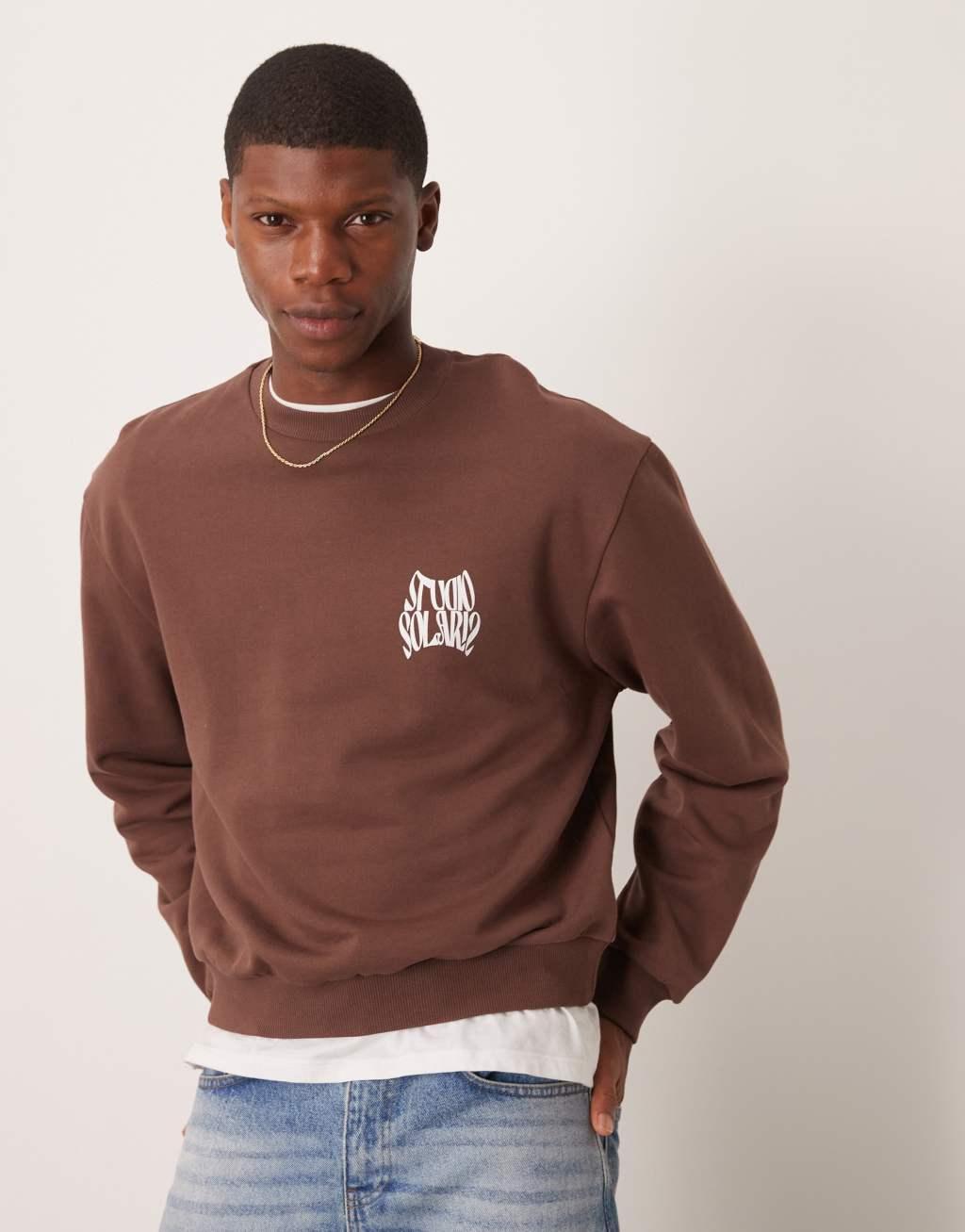 ASOS DESIGN boxy oversized sweatshirt with print in brown Product Image
