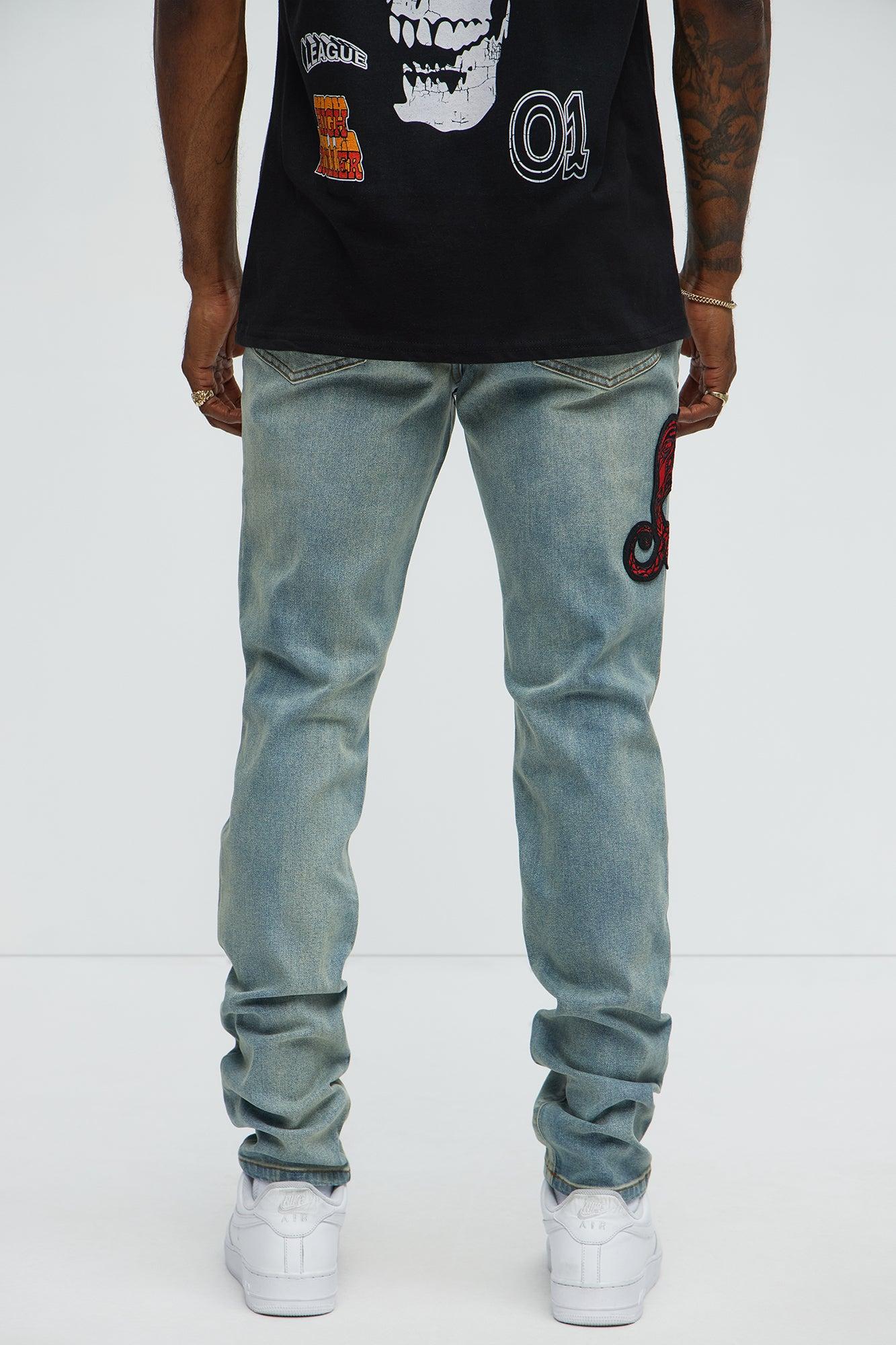 Side Snake Rip And Repair Stacked Skinny Jeans - Vintage Blue Wash Product Image