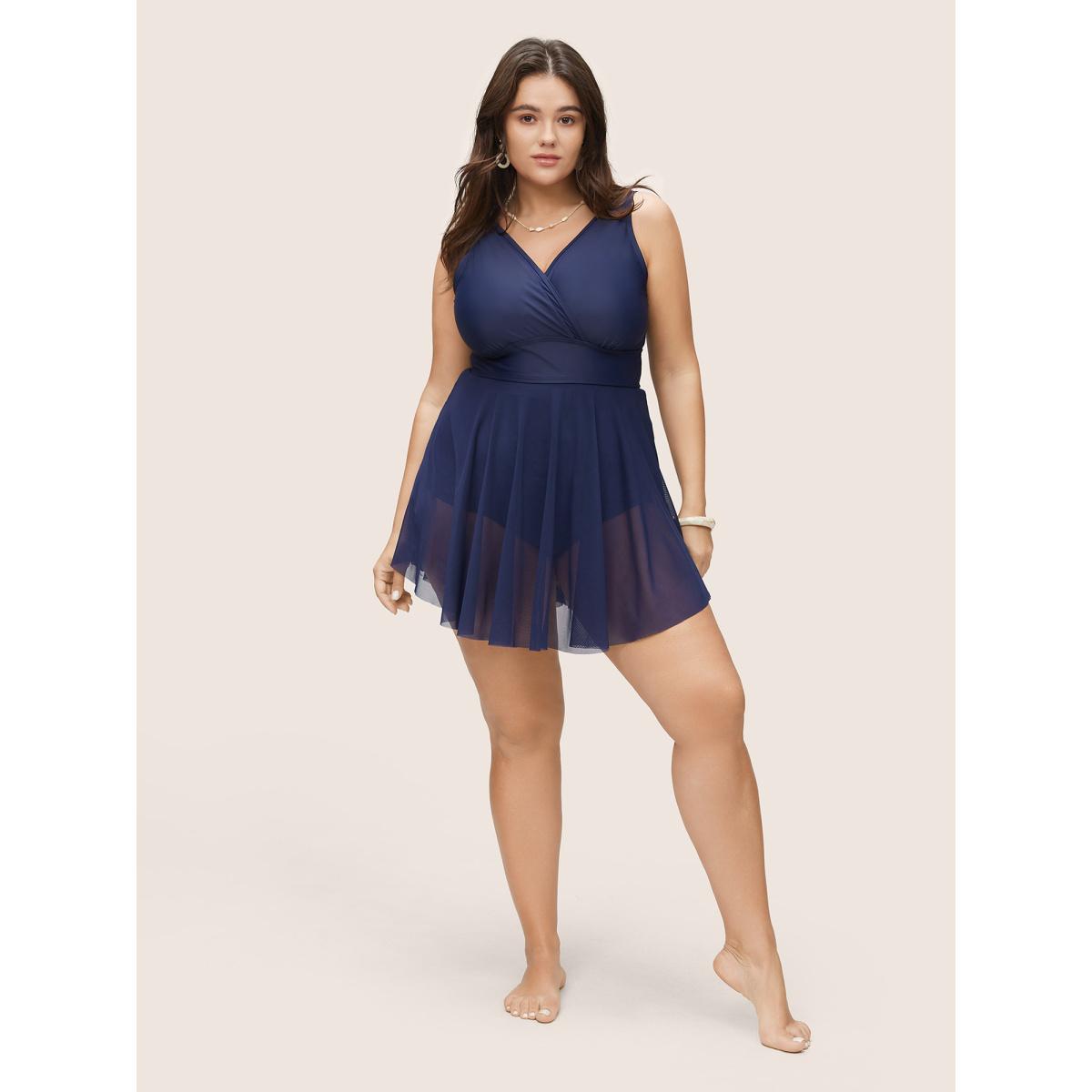 Plus Size Overlap Collar Mesh Patchwork Flutter Hem Swim Dress Women's Swimwear Indigo Beach Skinny V-neck High stretch Curve Swim Dresses BloomChic 28/5X Product Image