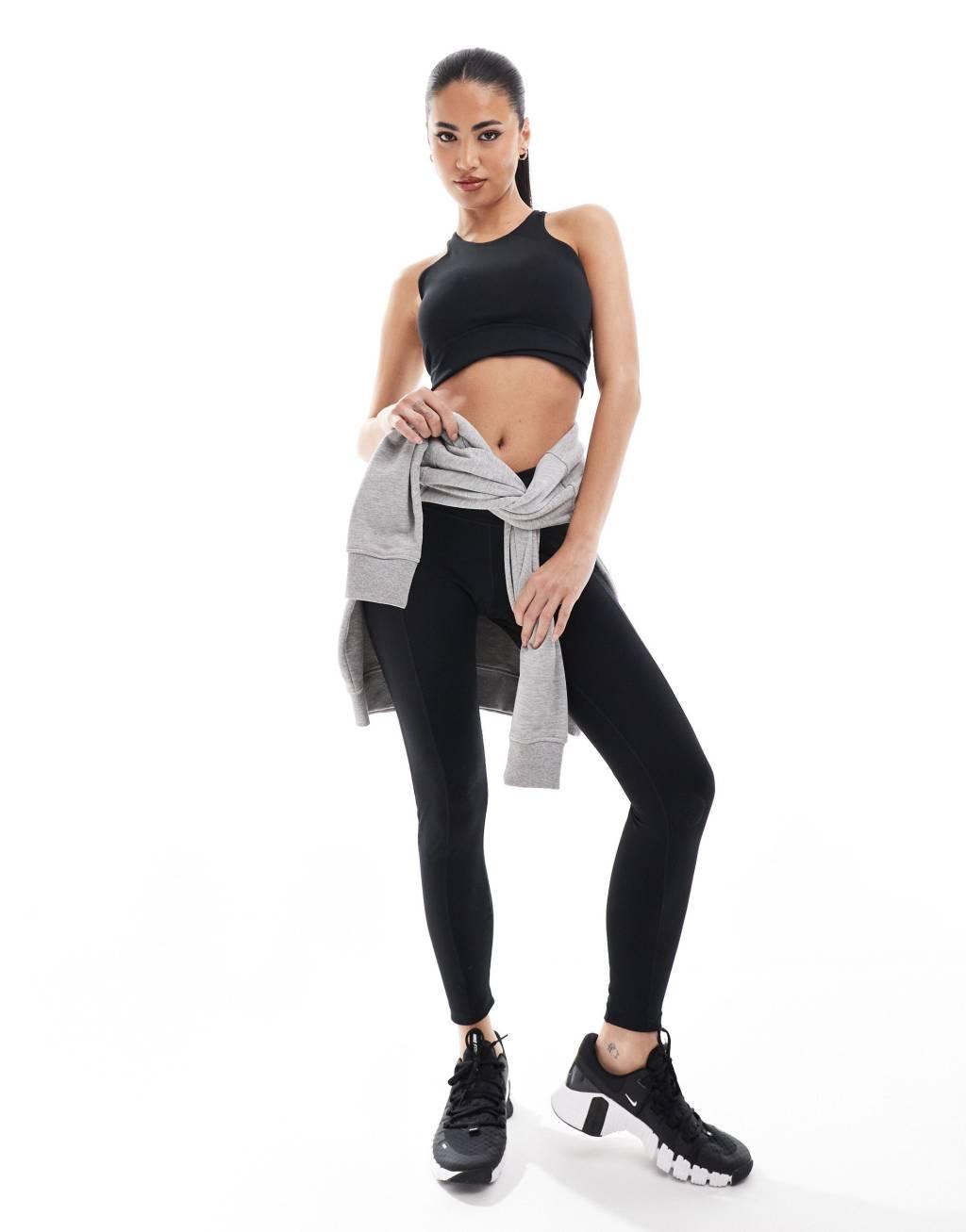 Nike Training One wrapped light support sports bra in black Product Image