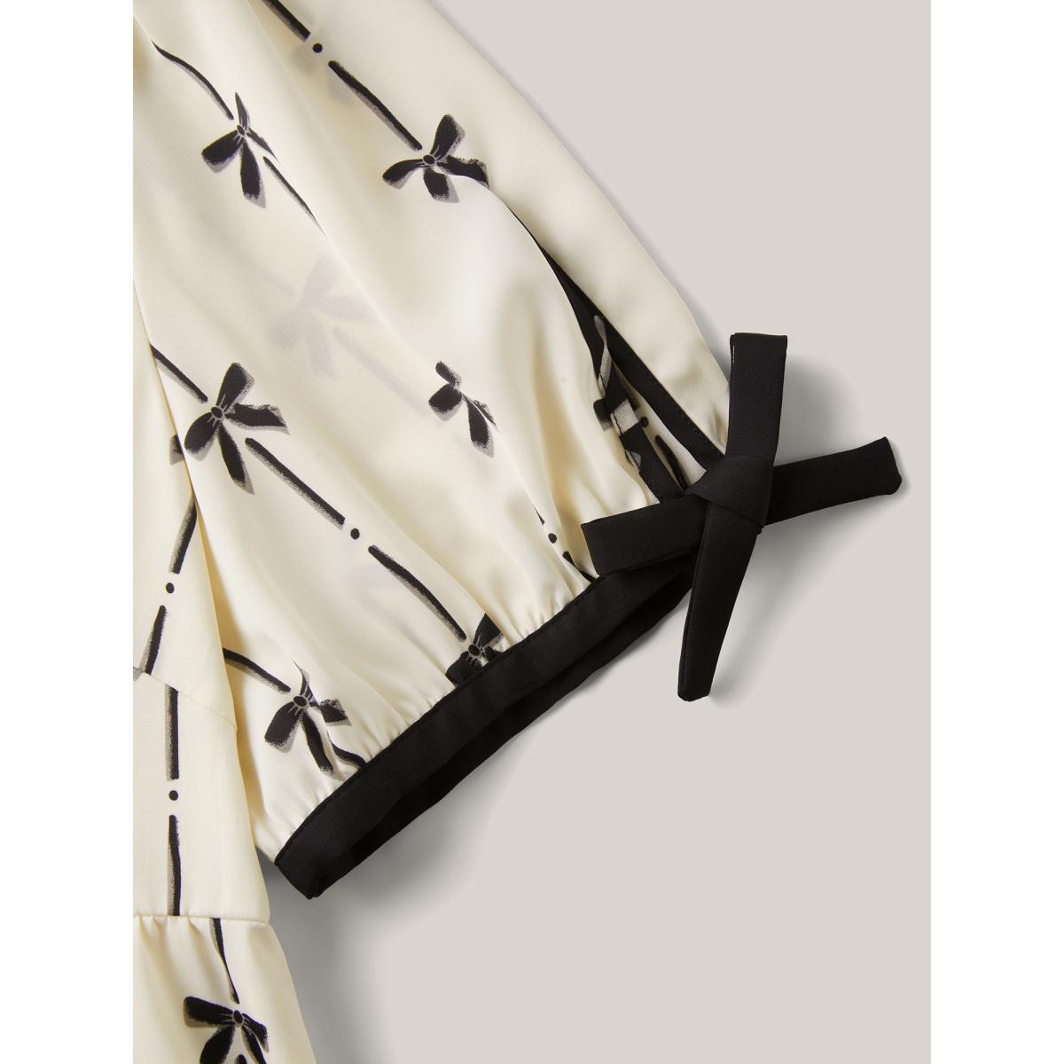 Plus Size Beige Bow Detail Printed Color Contrast Blouse Women Romantic Half Sleeve V-neck Elegant Blouses BloomChic 30/6X Product Image