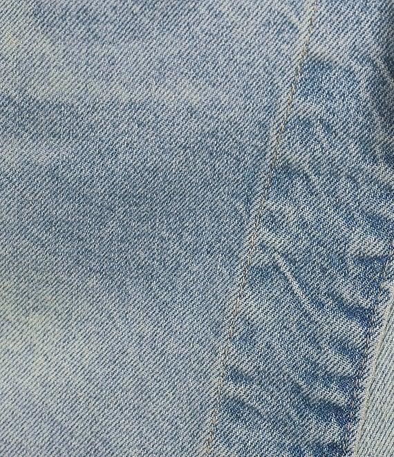 Free People Emmy Denim High Waisted Asymmetric Raw Hem Tie Side Mini Skort Product Image