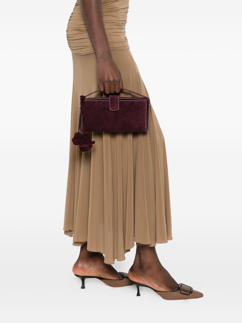 Apolonia rose-embellished suede clutch bag Product Image