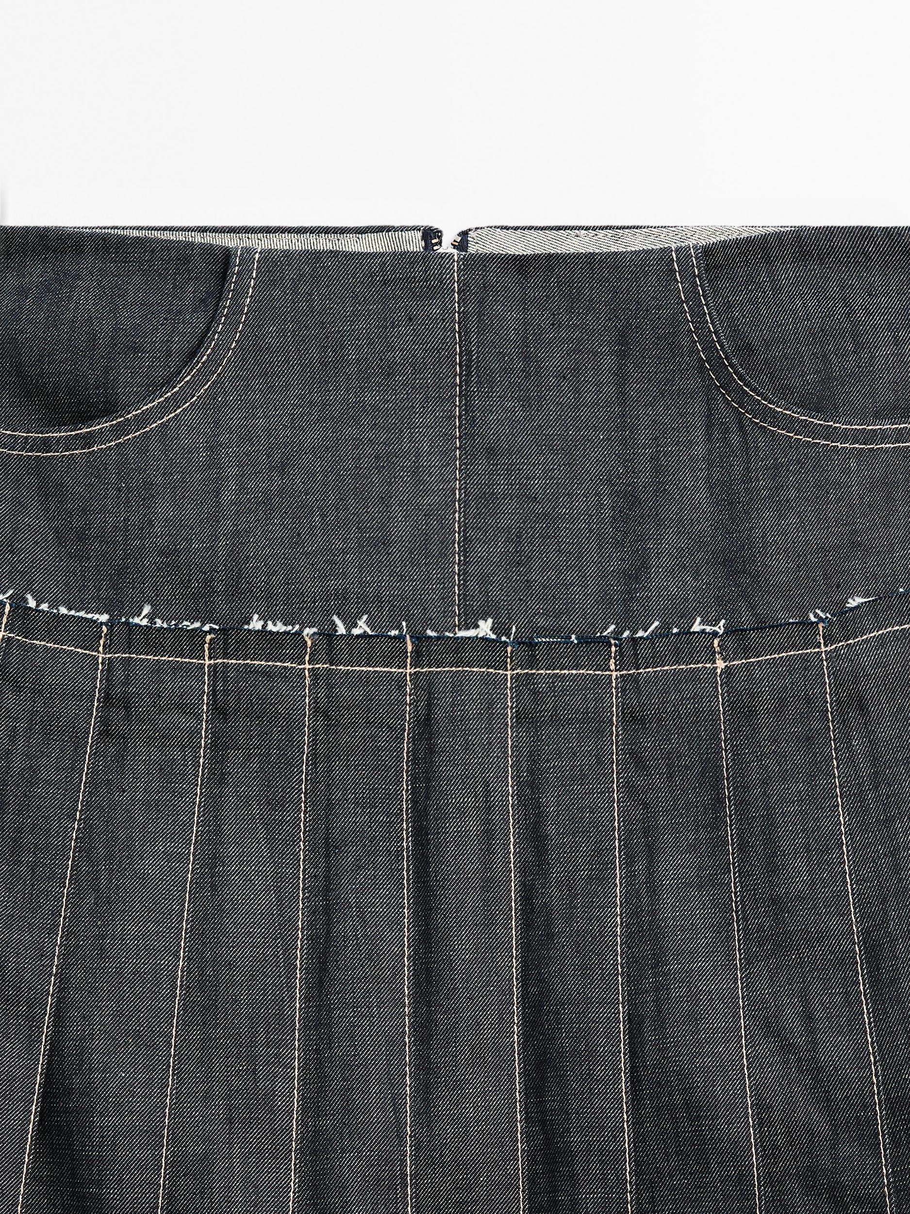 Denim midi skirt with box pleats Product Image