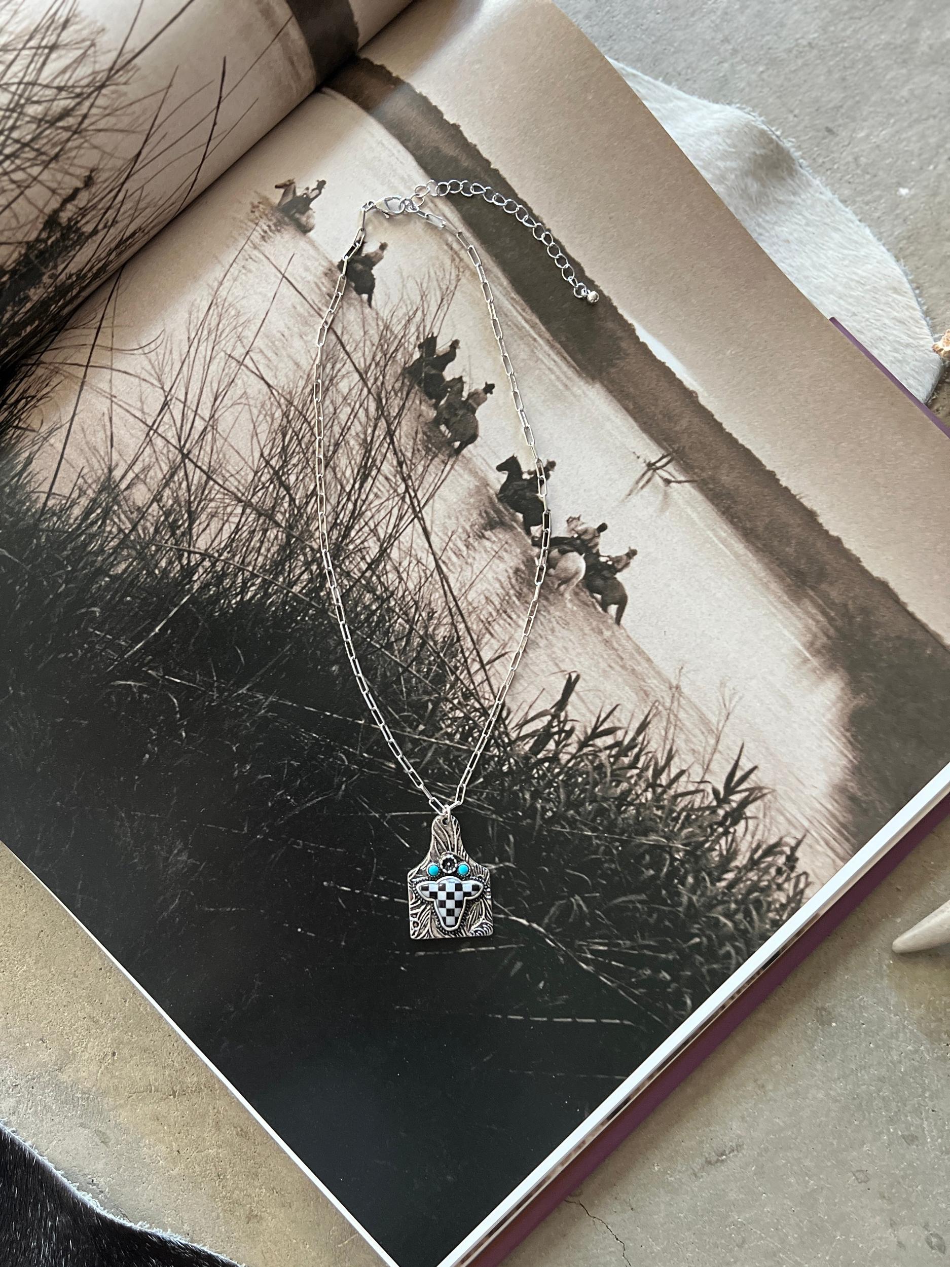 Checkered Cow Tooled Tag Necklace Product Image