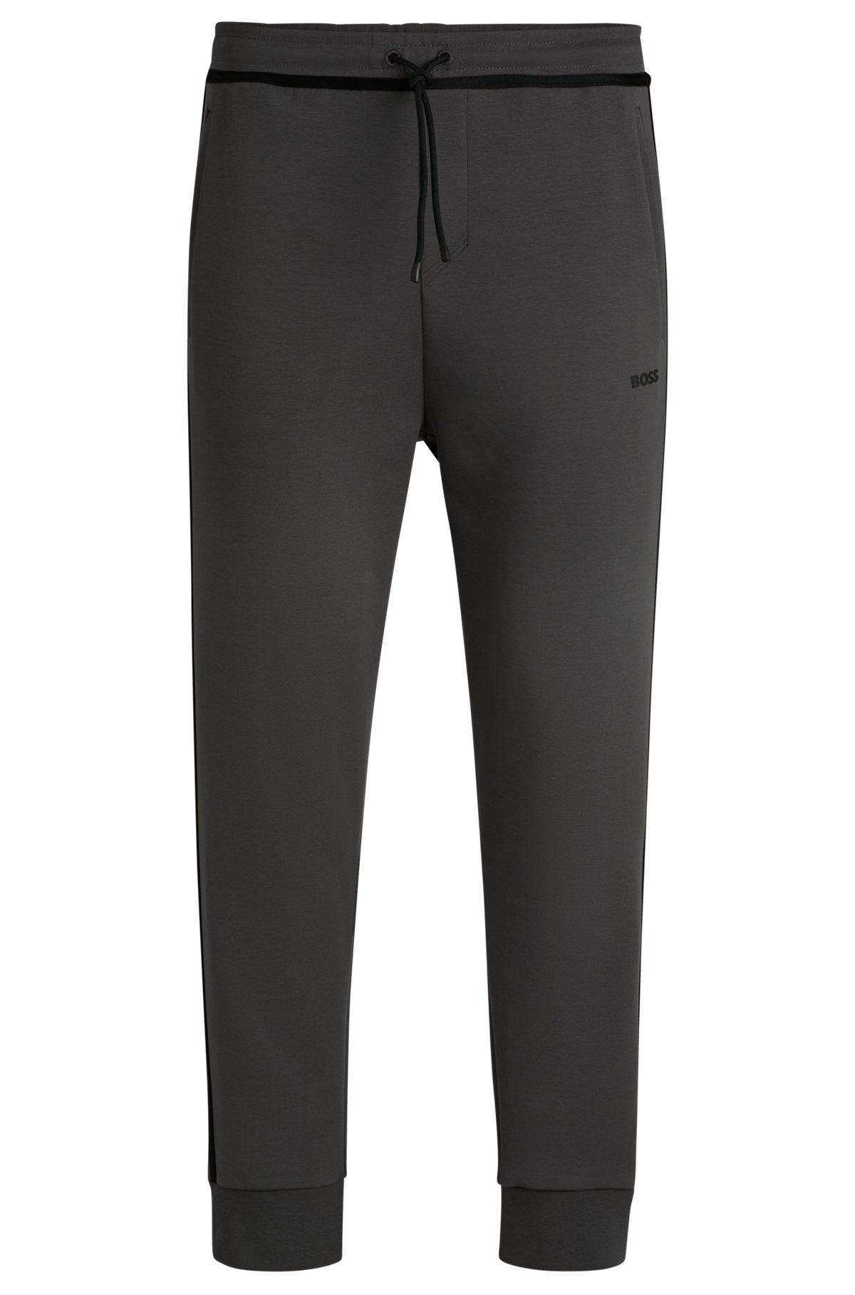 Tracksuit bottoms with tape and logo Product Image