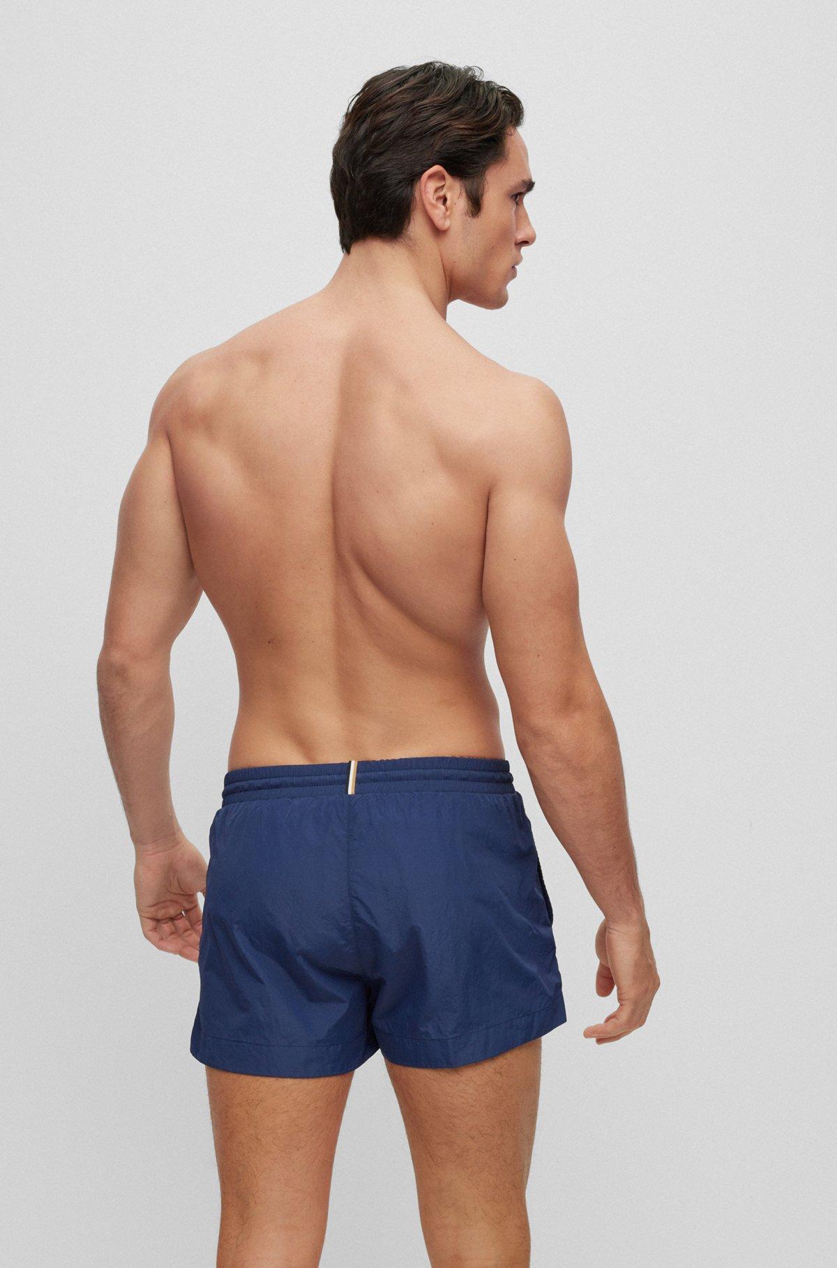 Quick-drying swim shorts with outline logo Product Image