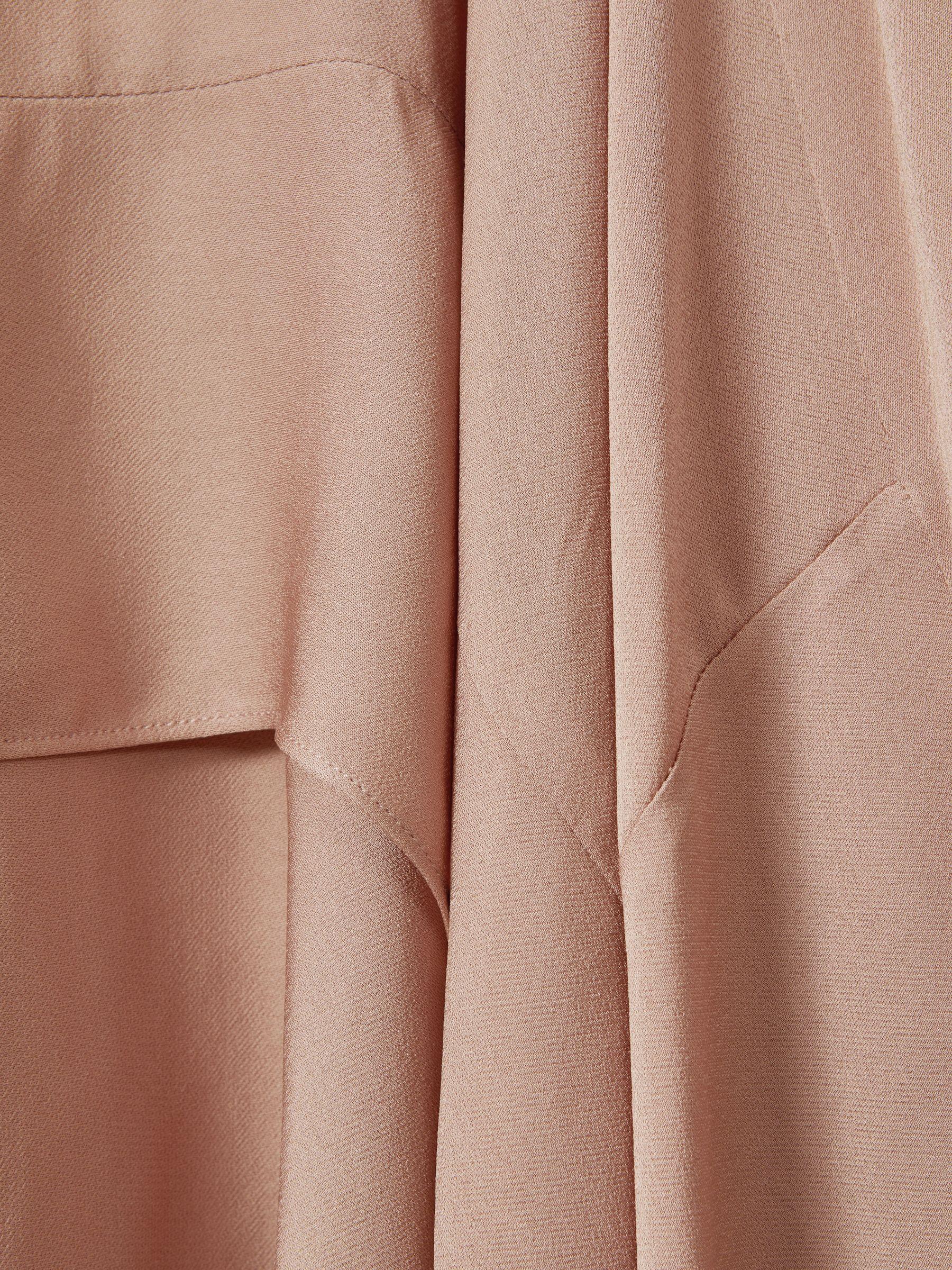 Side Pleat Asymmetric Midi Skirt in Nude Product Image