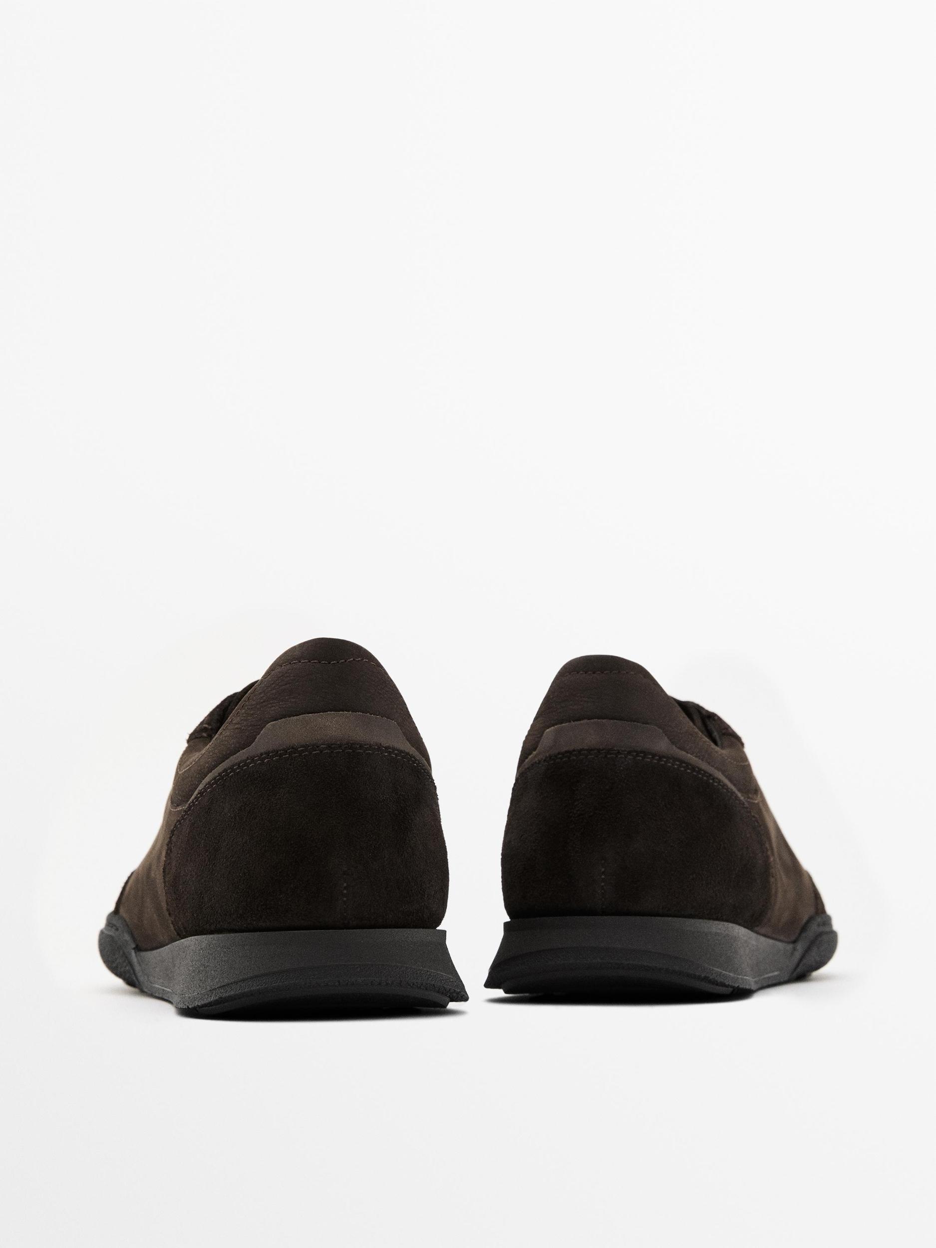 Split leather trainers with contrast soles Product Image