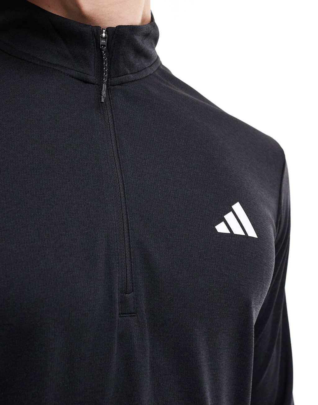 adidas Training Essentials 1/4-Zip Long Sleeve T-shirt in black Product Image