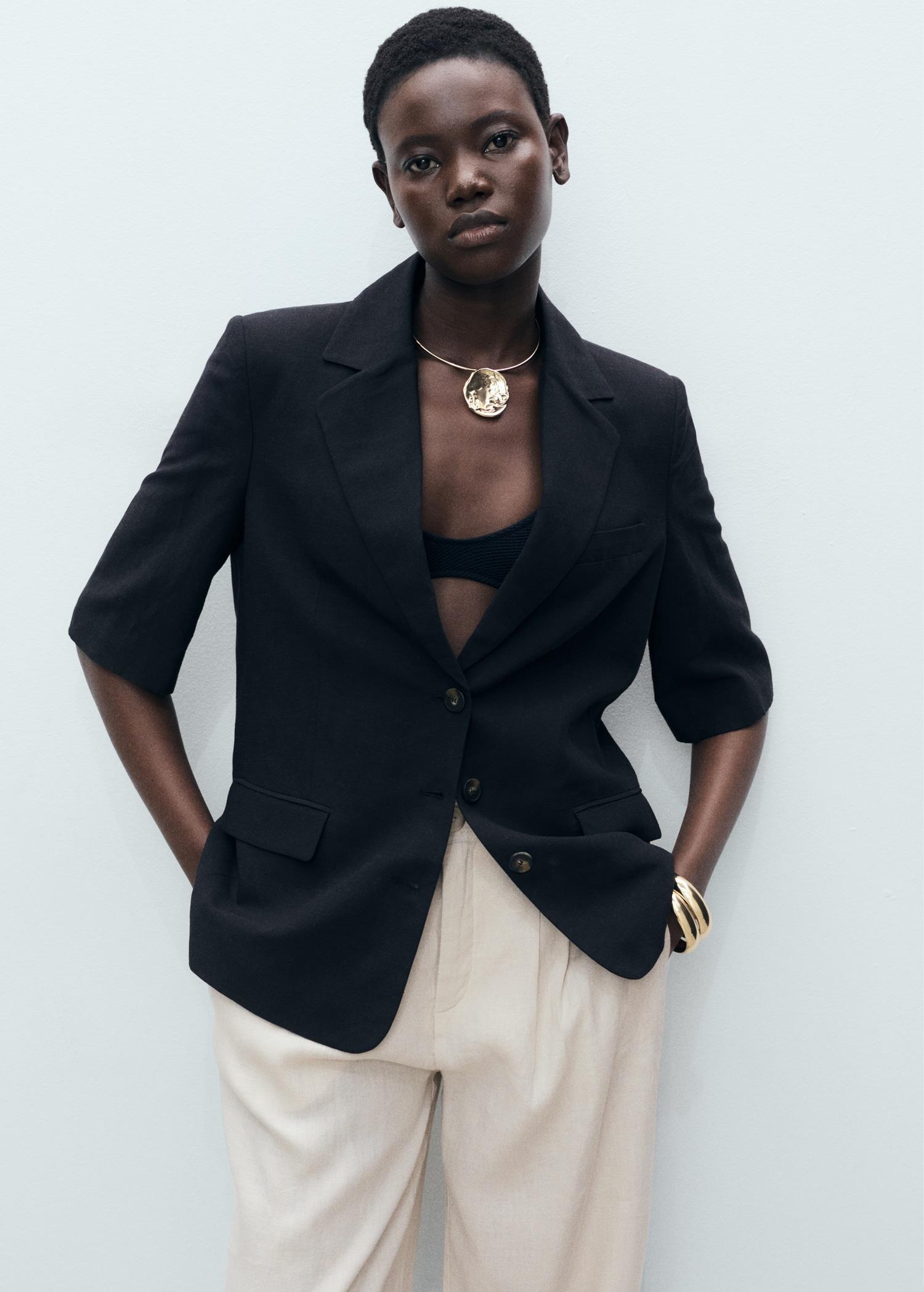 Linen pants with tortoiseshell button - Women | MANGO USA Product Image