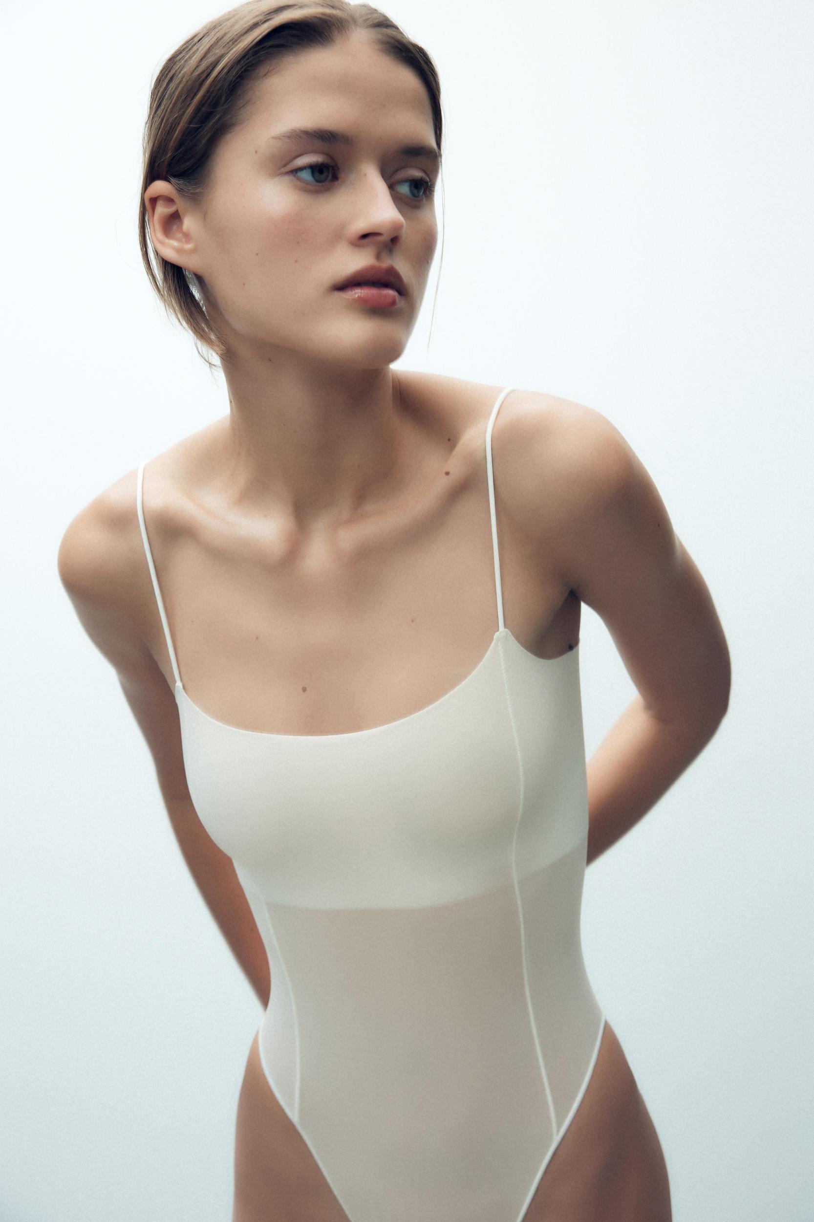 FITTED STRAPPY BODYSUIT WITH SEAMS Product Image