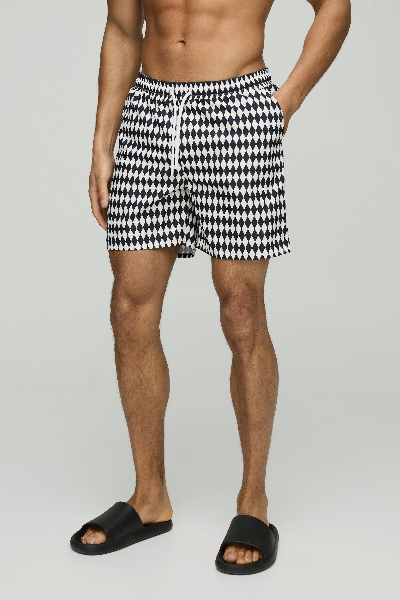 2 Pack Checkerboard and Plain Mid Length Swim Trunks | boohooMAN USA Product Image