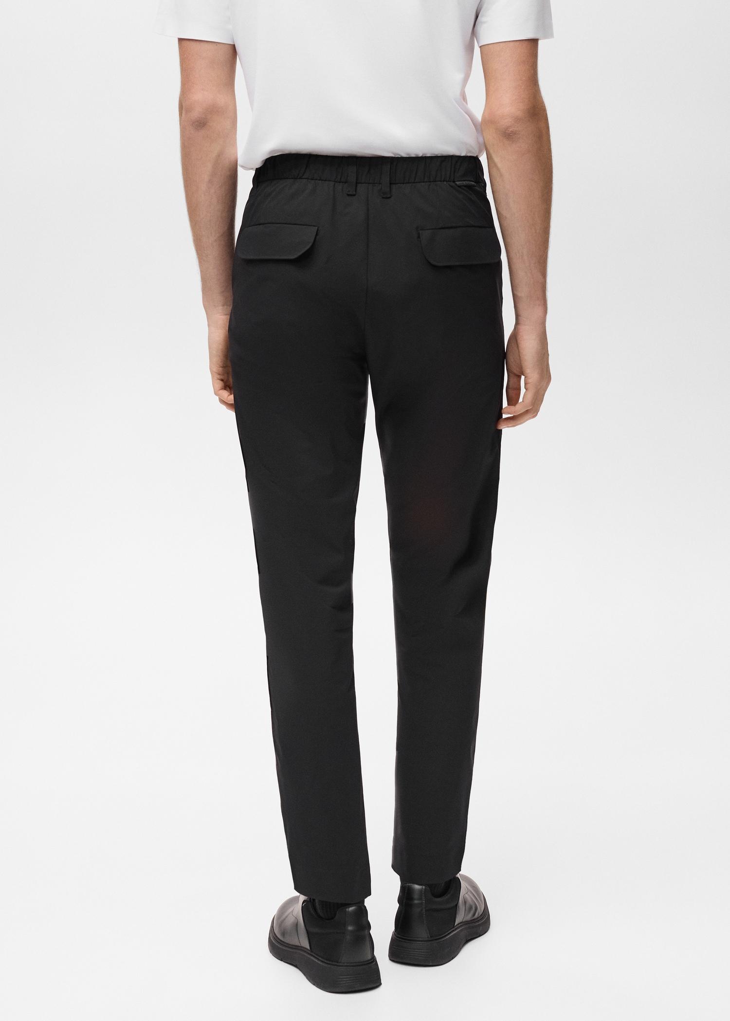 Stretch fabric slim-fit pants with drawstring - Men | MANGO USA Product Image