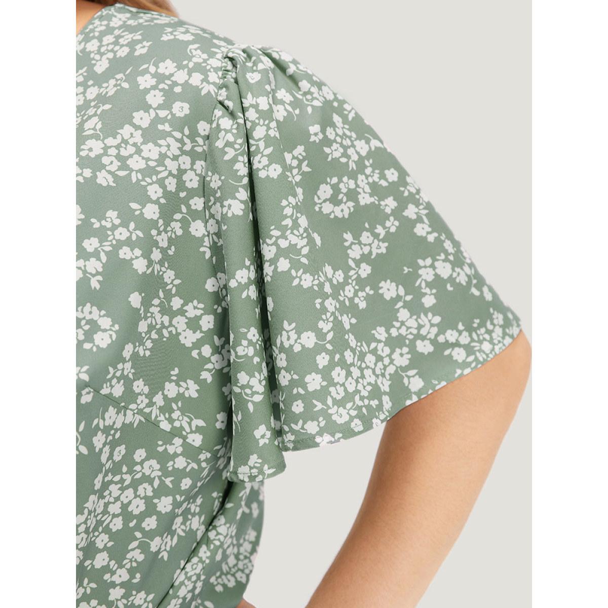 Plus Size Ditsy Floral Overlap Collar Flutter Sleeve Bodysuit Women Green Ditsy Floral Printed Bodysuits BloomChic 30/6X Product Image