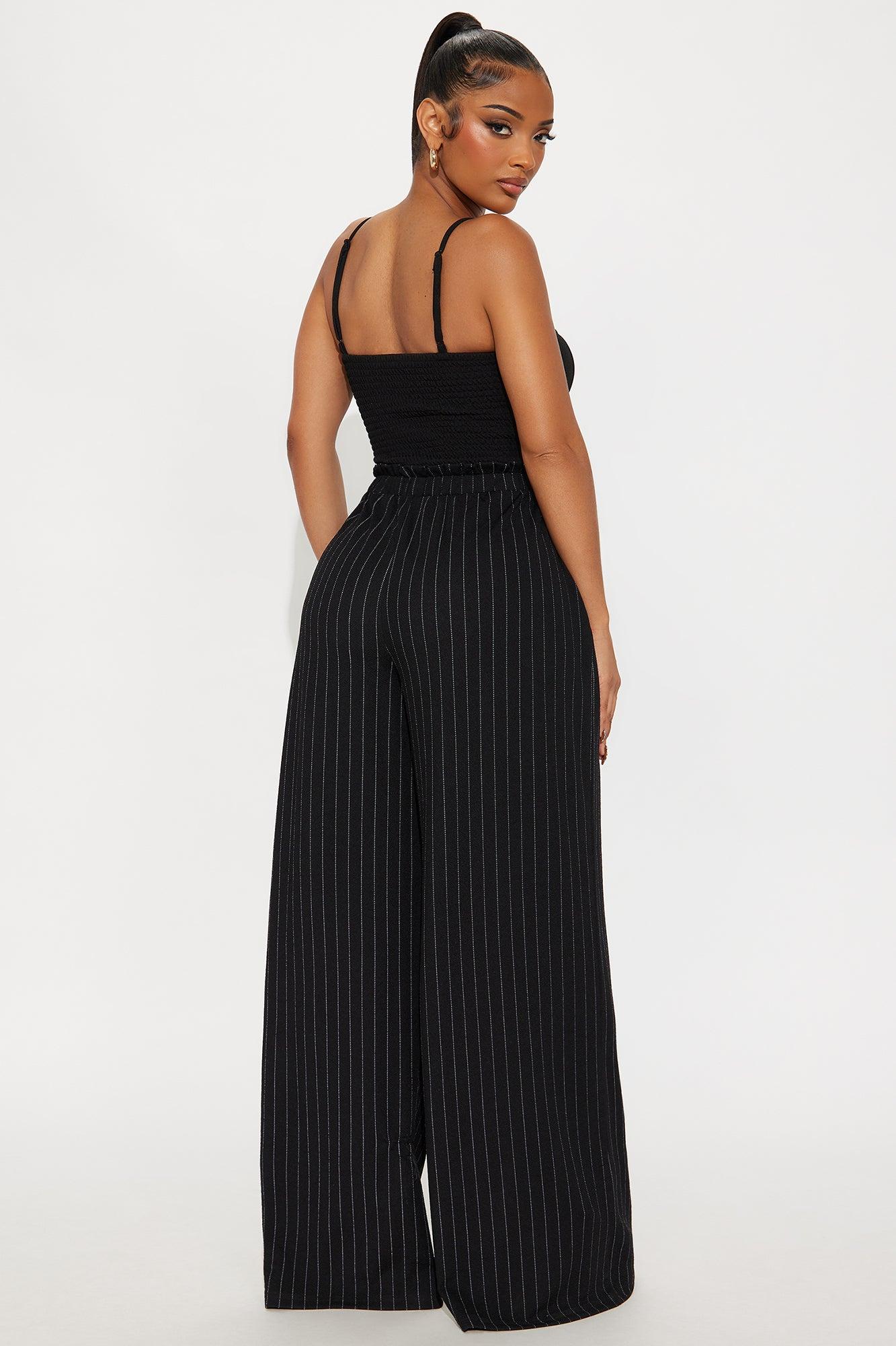 The Extra Mile Pinstripe Jumpsuit - Black/combo Female Product Image