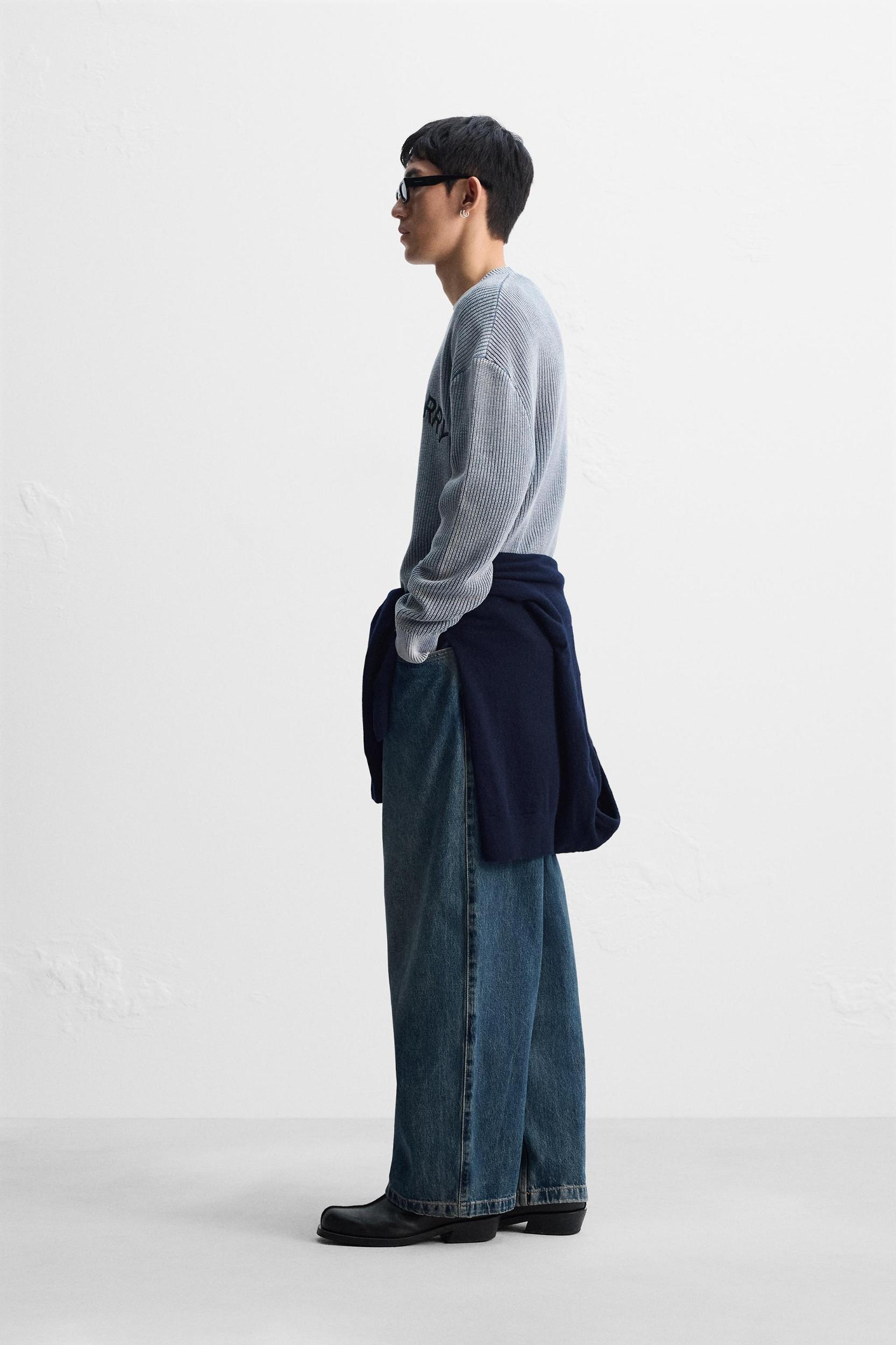 EMBROIDERED TEXT WASHED SWEATER Product Image