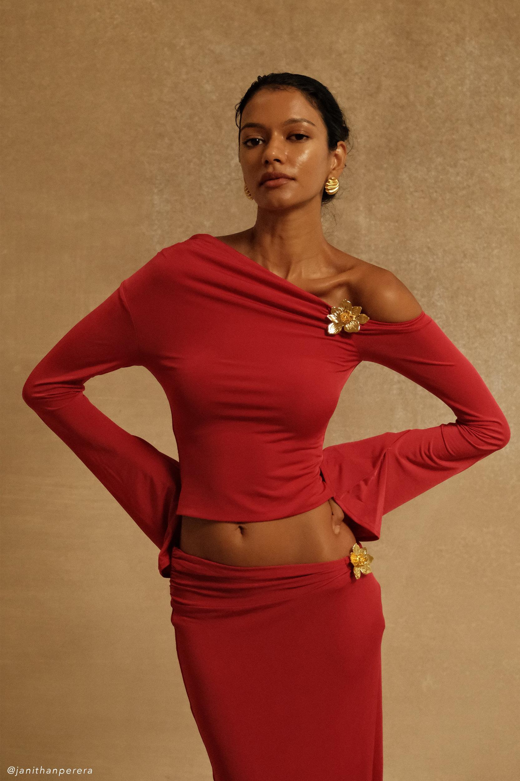 Ainsley Asymmetrical Long Sleeve Top With Floral Hardware - Fuchsia Pink Product Image