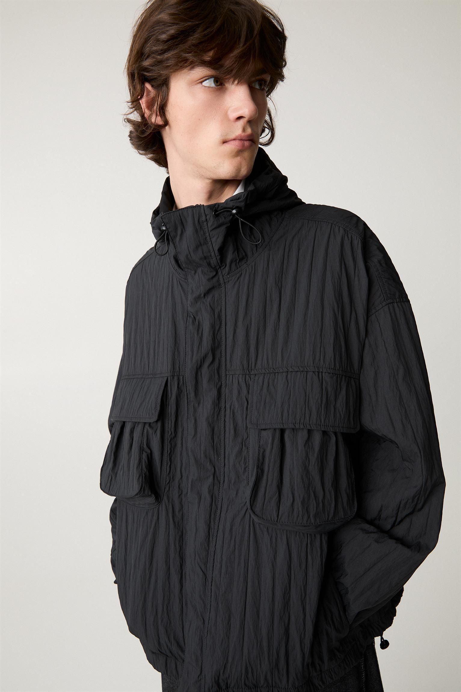 Creased raincoat with hood Product Image
