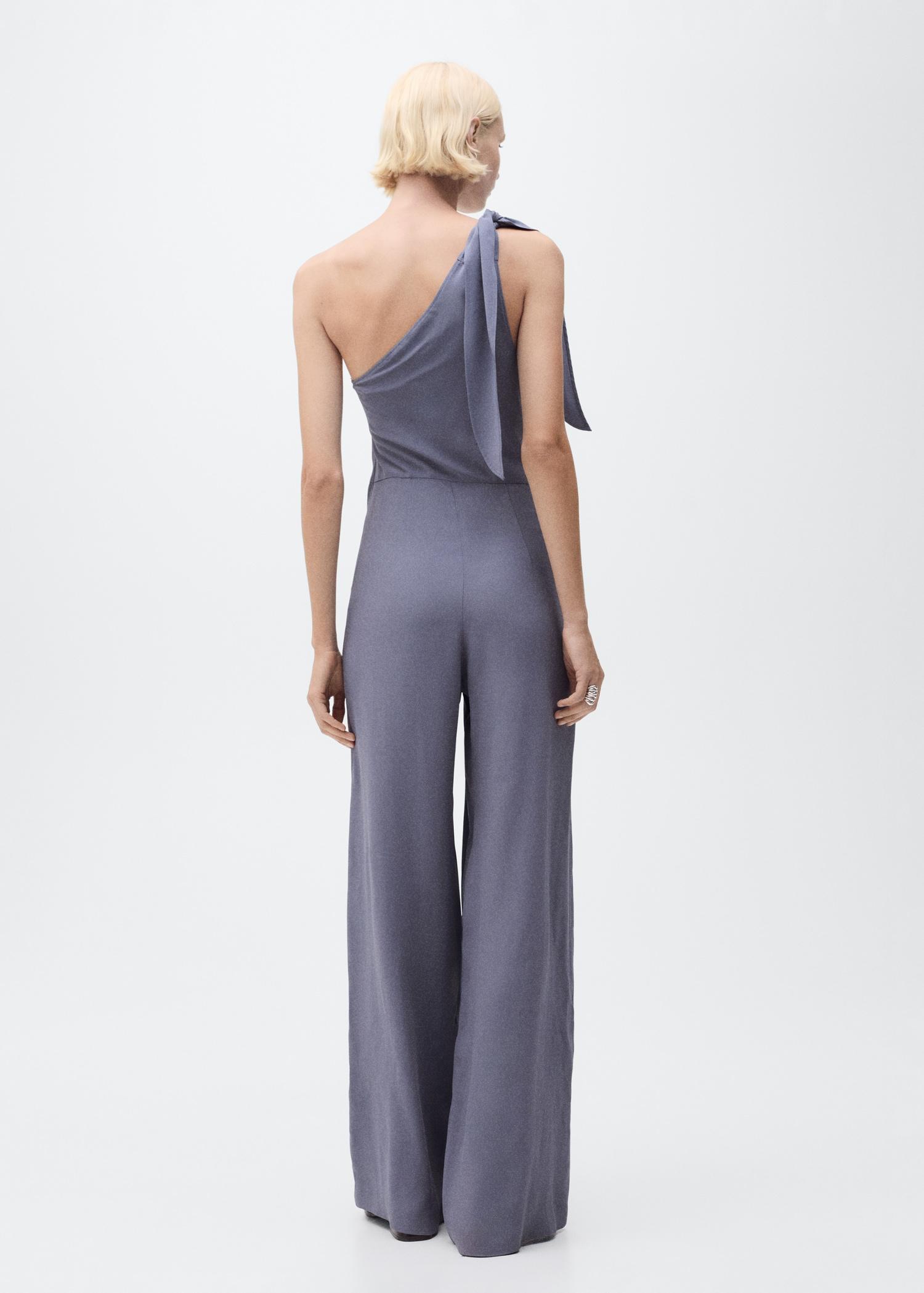 Asymmetrical satin jumpsuit with bow - Women | MANGO USA Product Image