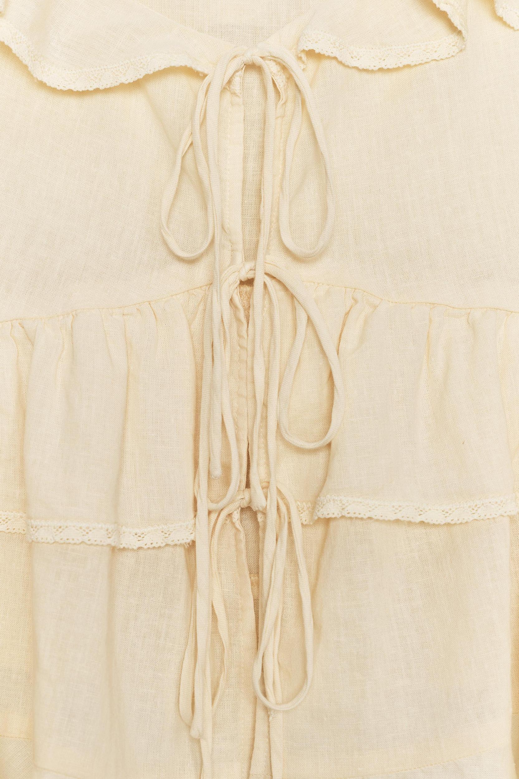 LINEN LACE TRIM RUFFLED TOP Product Image