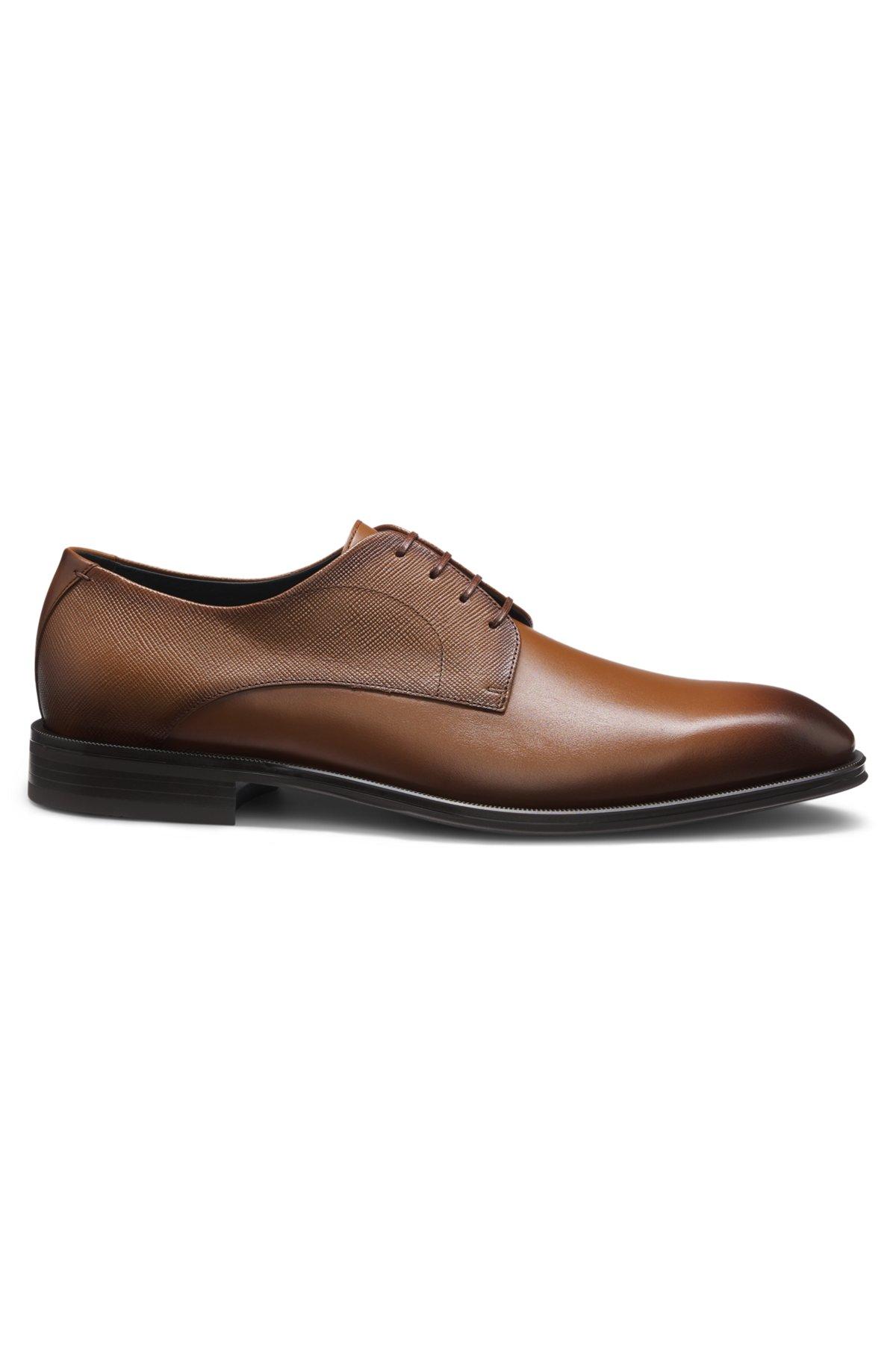 Derby shoes in textured and smooth leather Product Image