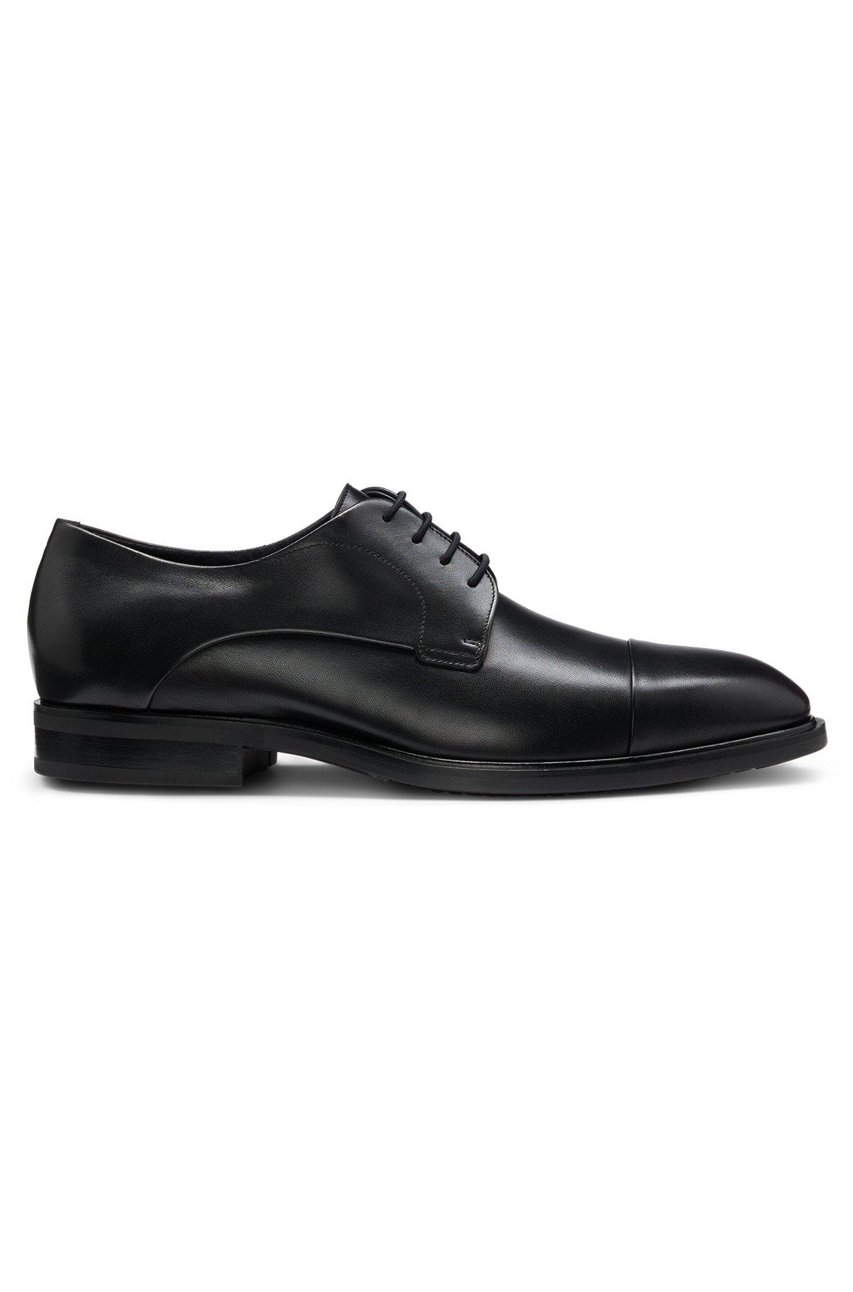 Cap-toe Derby shoes in leather Product Image