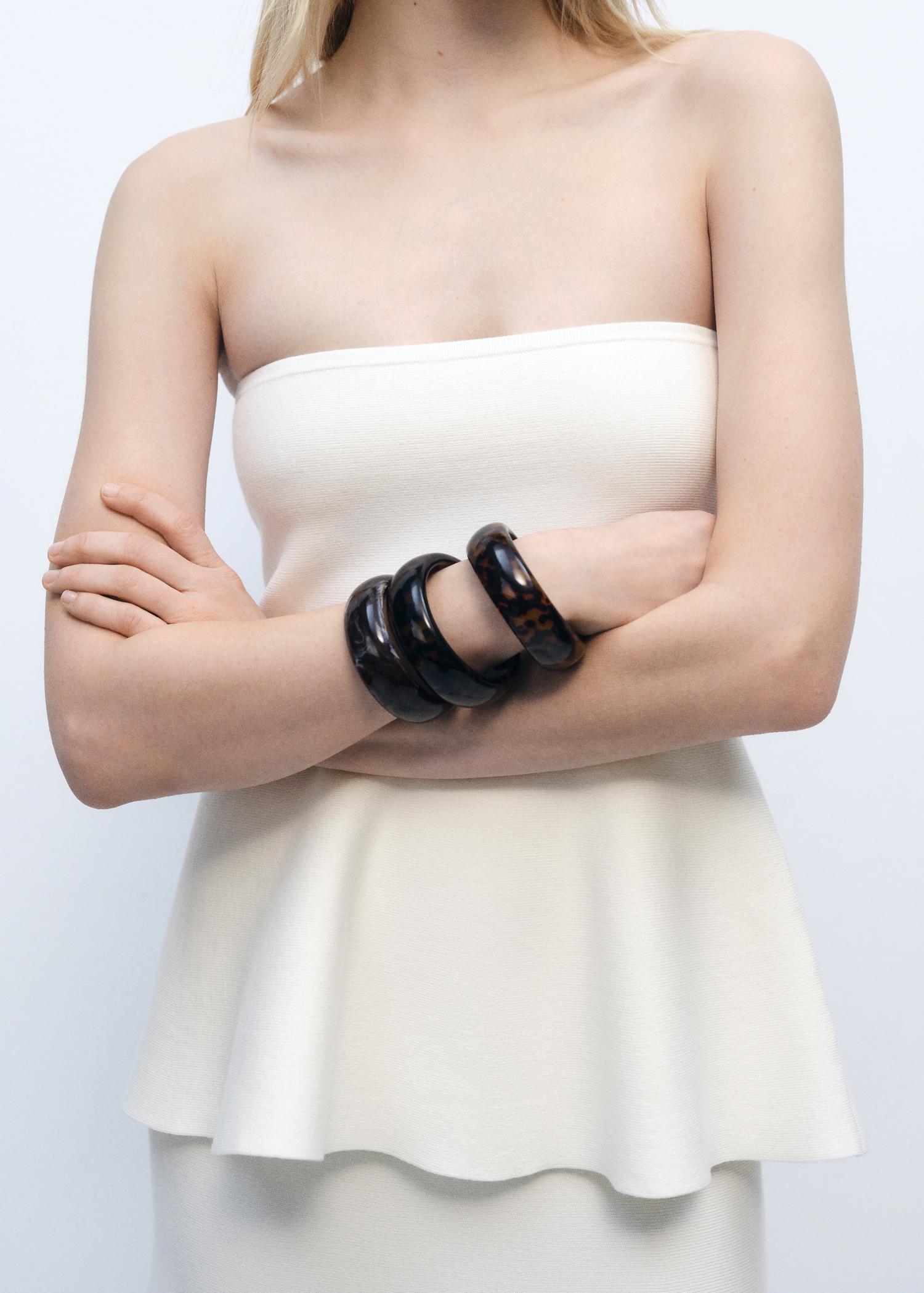 Fine-knit peplum top - Women | MANGO USA Product Image