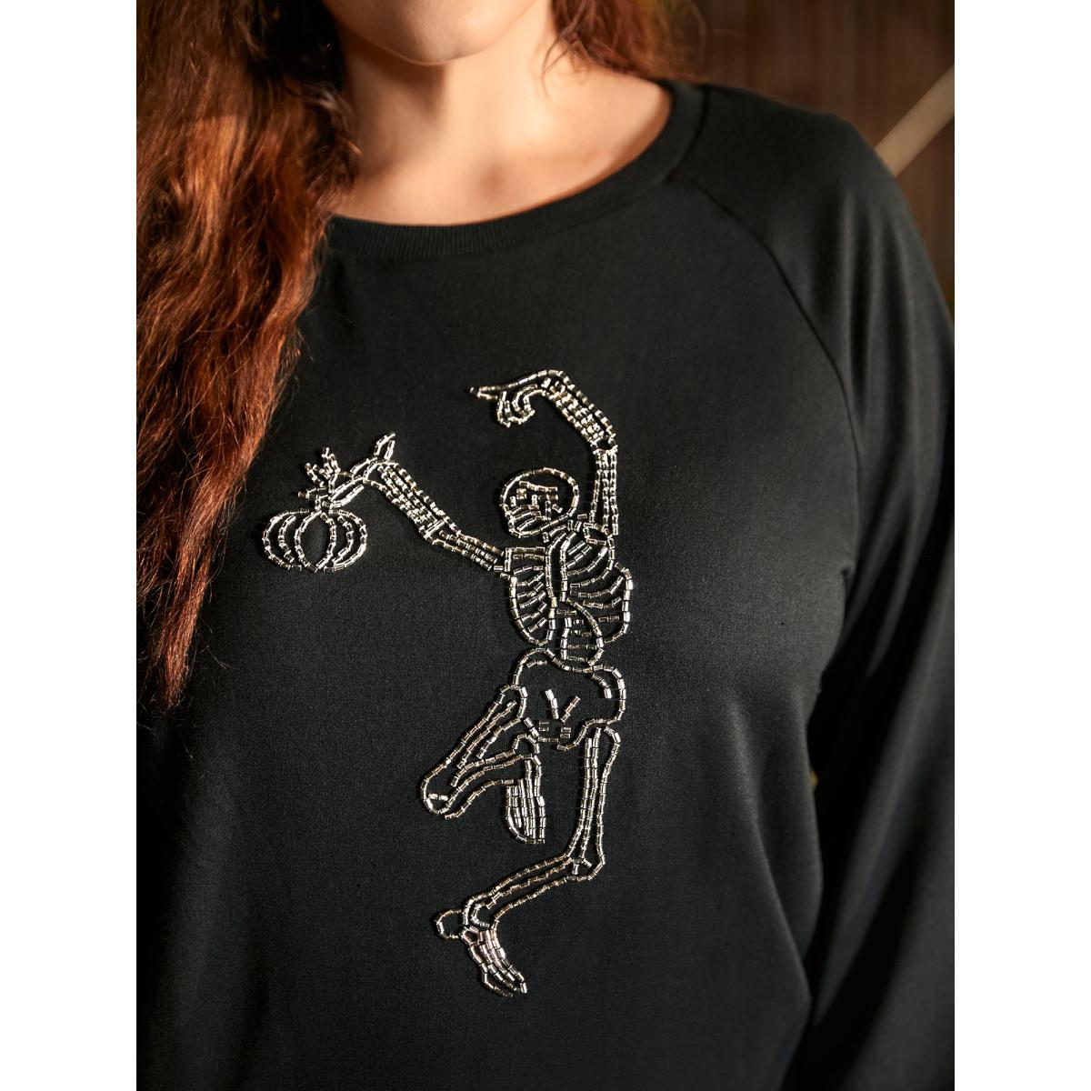 Plus Size Skull Embellished Raglan Sweatshirt Women Black Casual Patchwork Loose Round Neck Everyday Sweatshirts BloomChic 26/4X Product Image