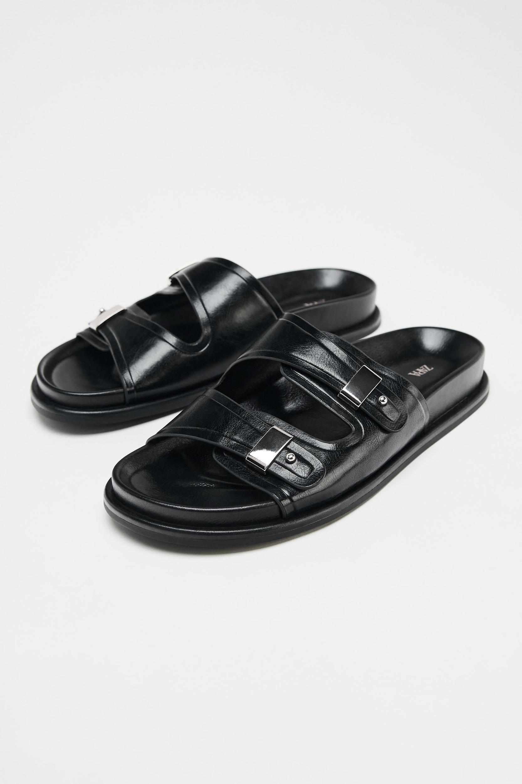 FLAT SANDALS WITH METALLIC DETAILS Product Image