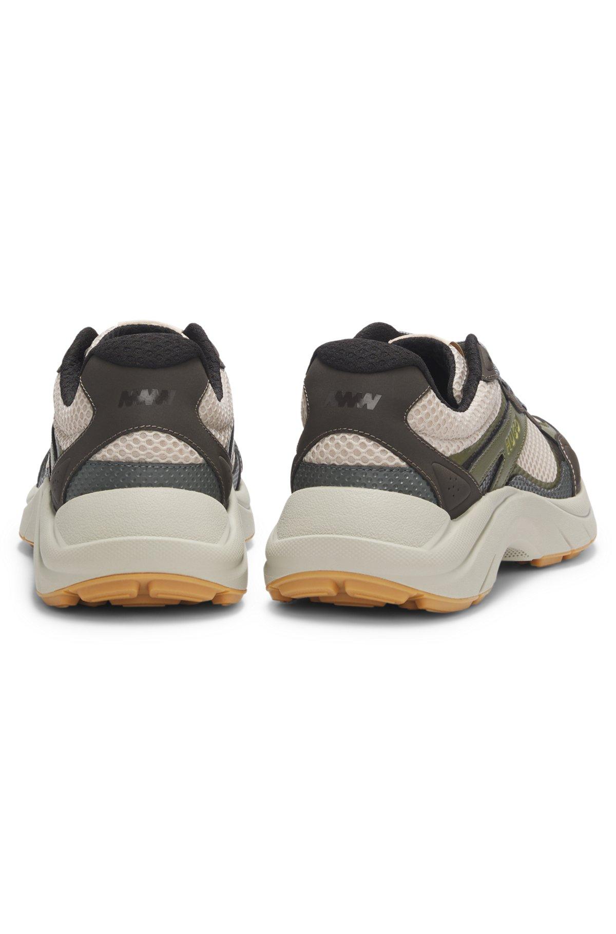 Trainers with mesh and faux leather Product Image