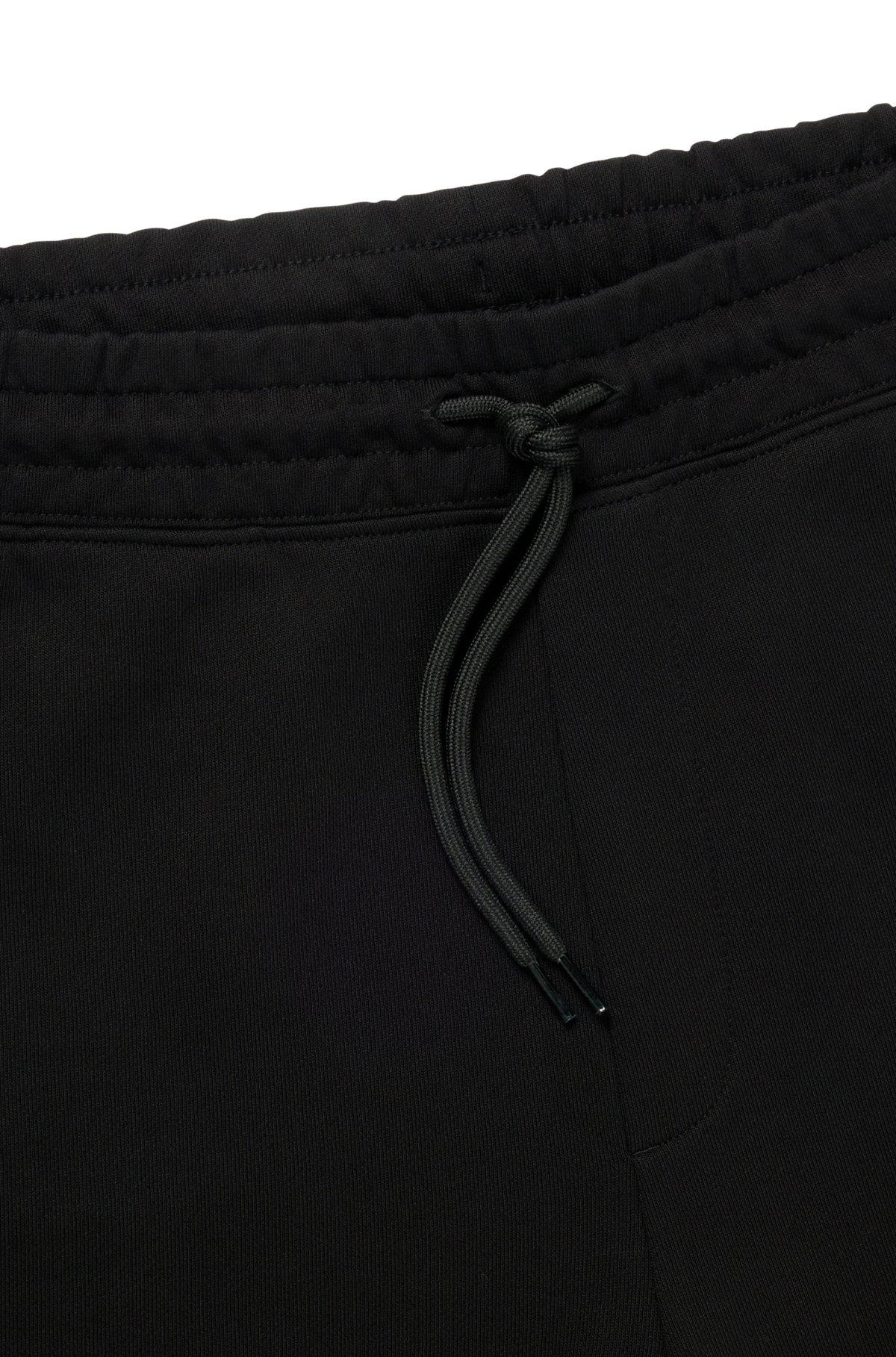 Cotton-terry shorts with blue logo patch Product Image