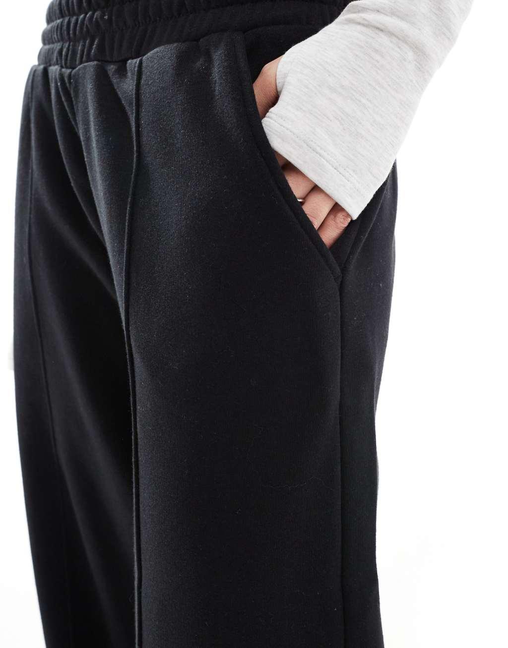 Bershka wide leg sweatpants in black Product Image