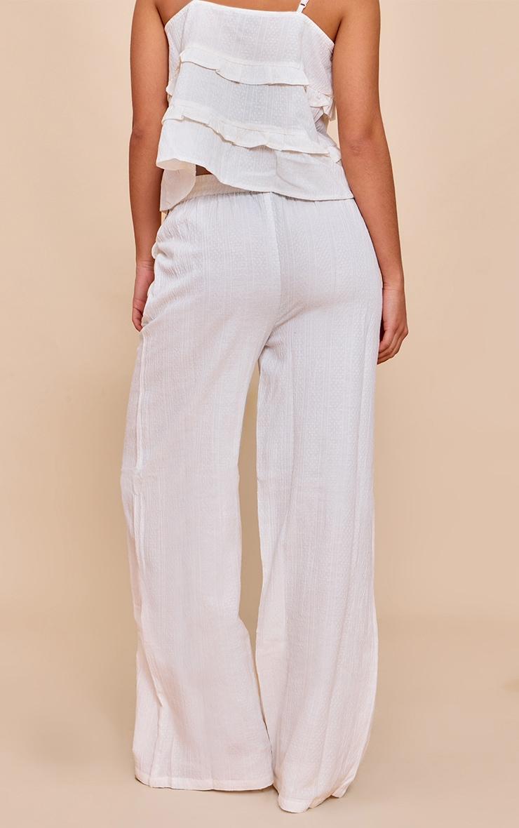 White Textured Mid Rise Wide Leg Pants Product Image